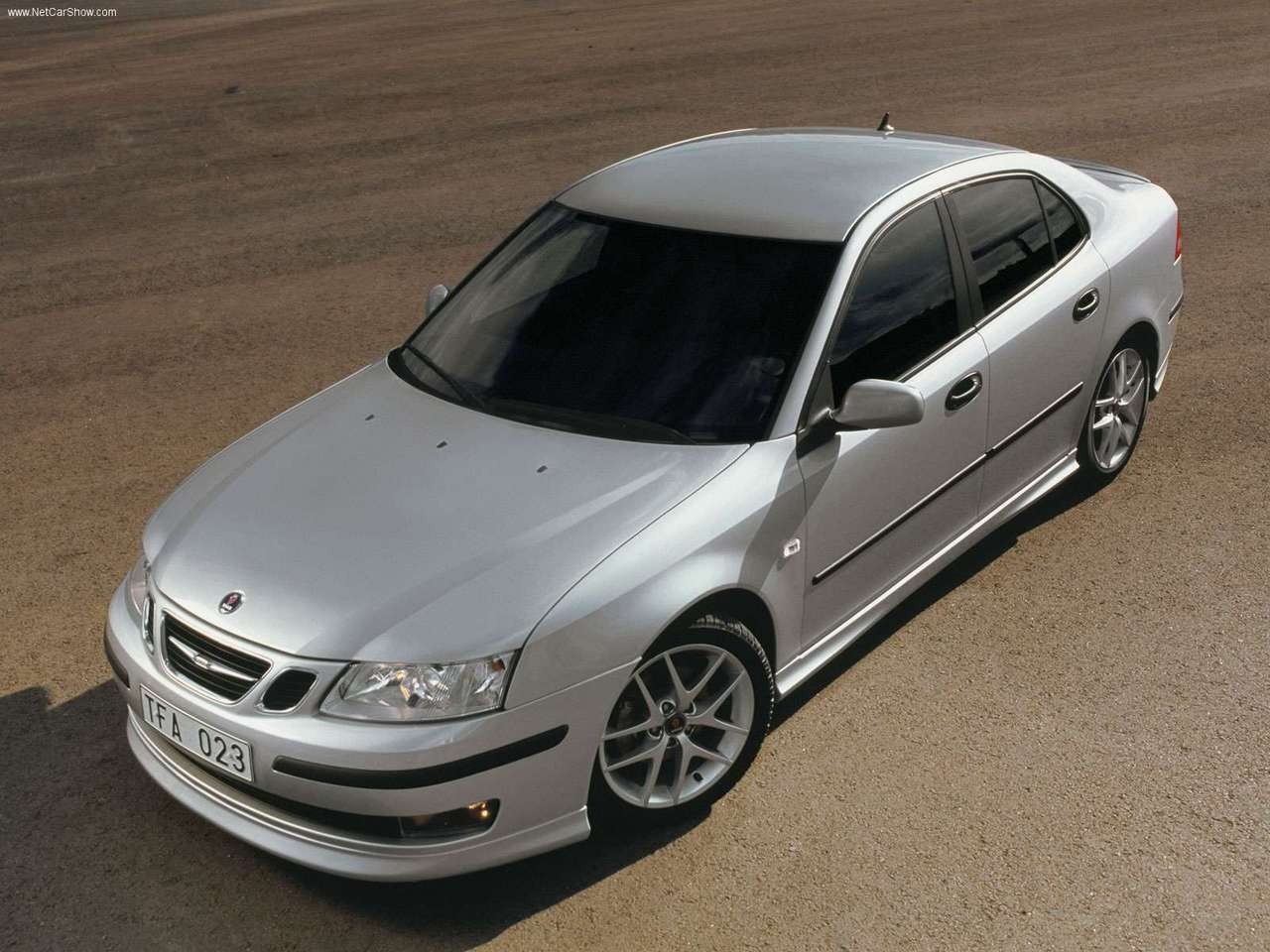 Silver Saab 9-3 Sedan parked on dirt road HD Wallpaper