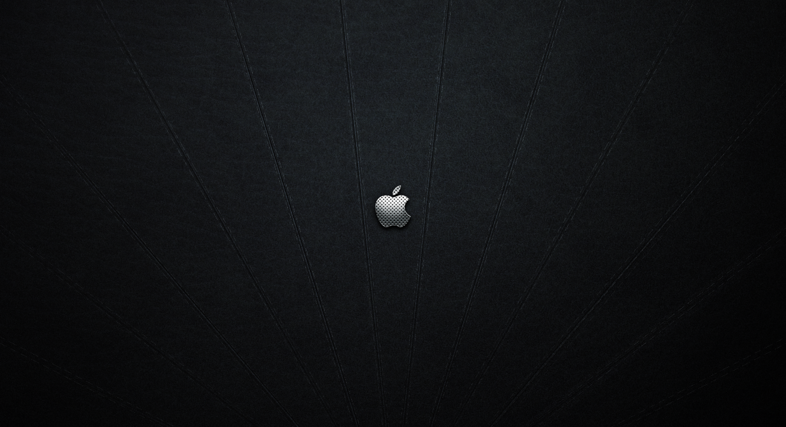 Apple logo on a dark textured background HD Wallpaper