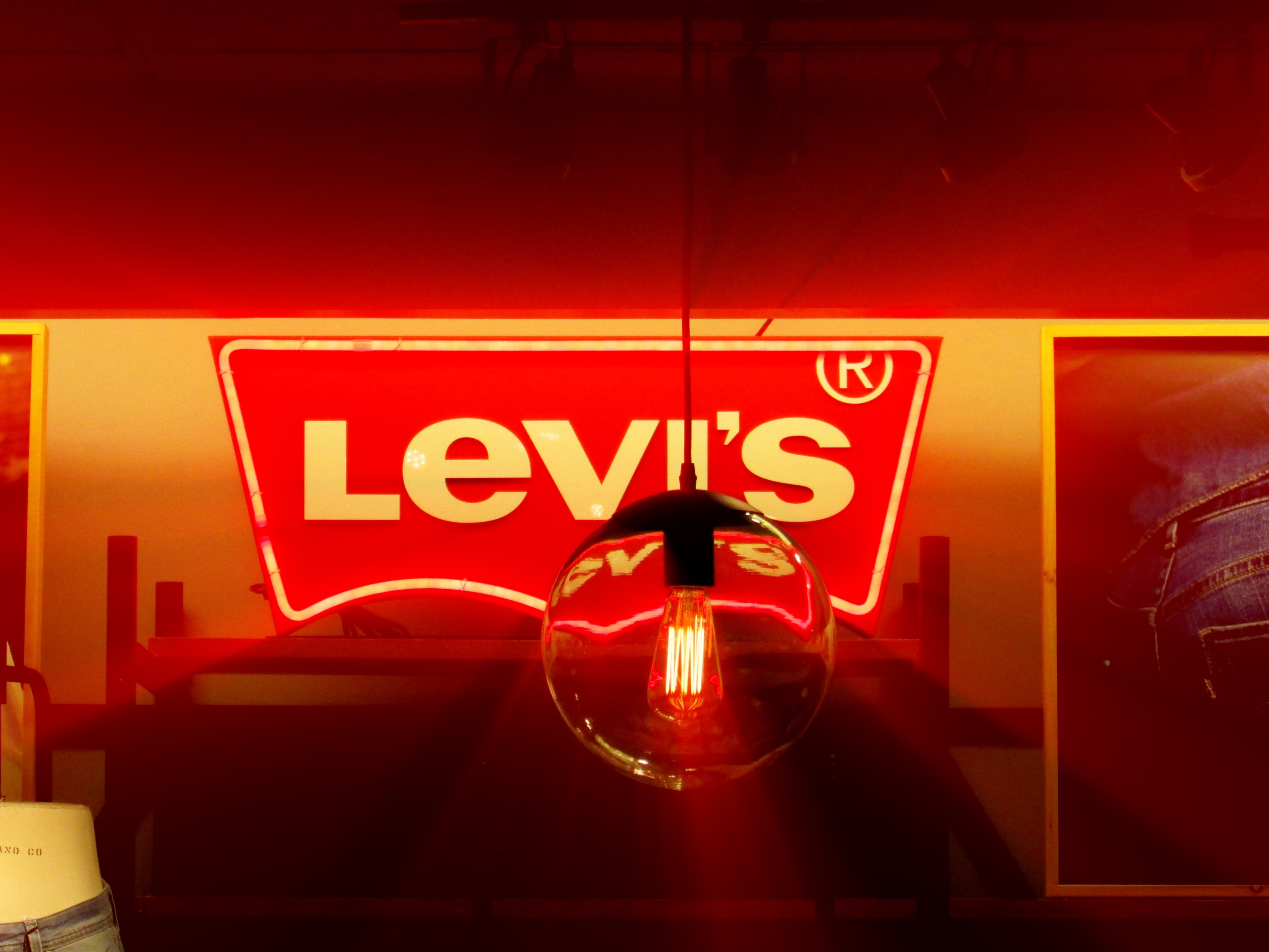 Levi's neon sign and hanging lamp HD Wallpaper