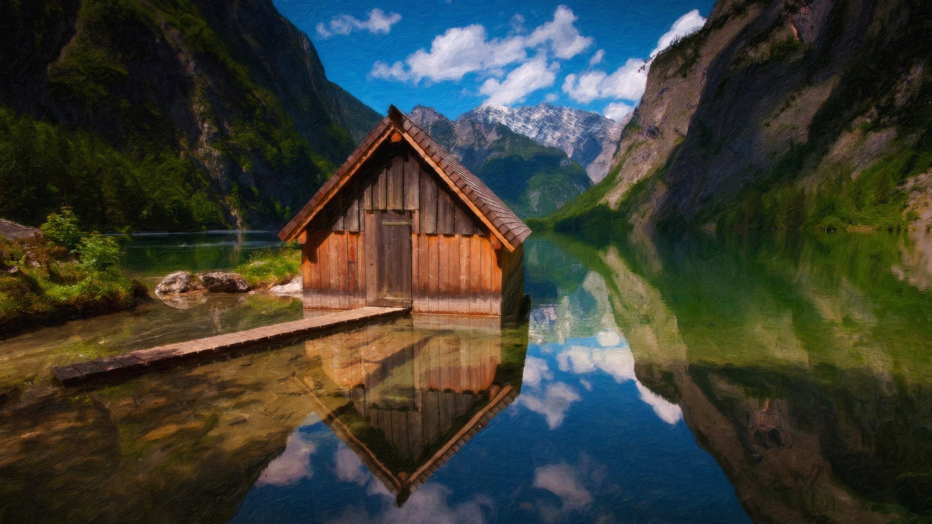 Wooden boathouse on a calm lake with mountains and reflections HD Wallpaper