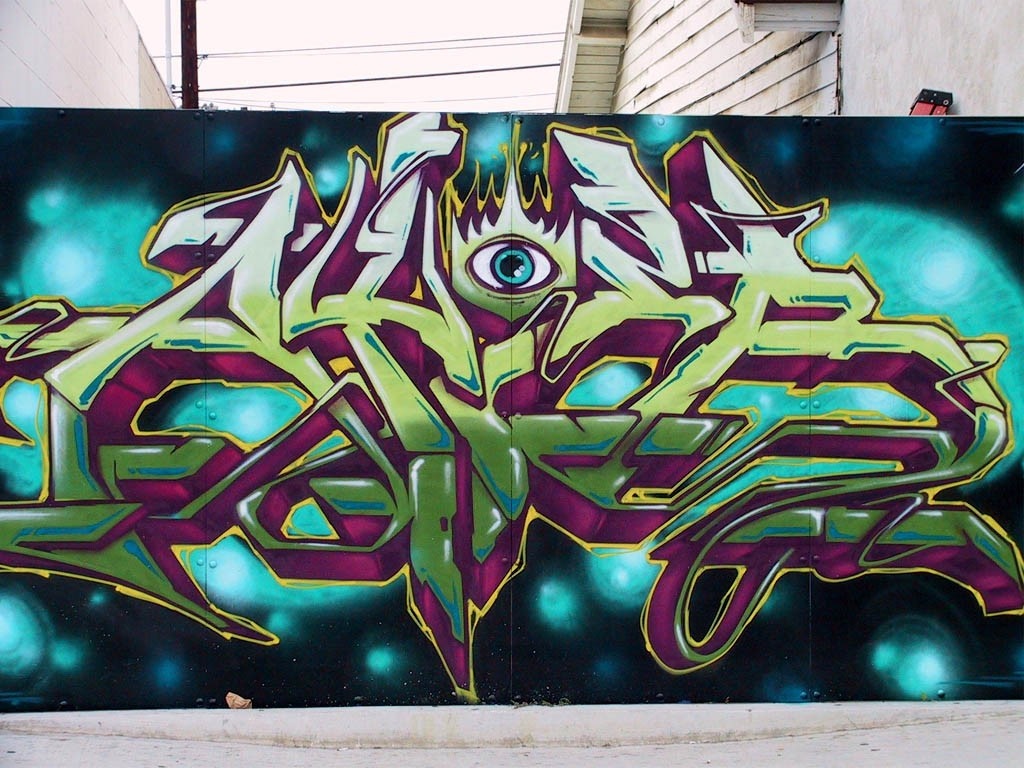 Graffiti art with an eye motif HD Wallpaper