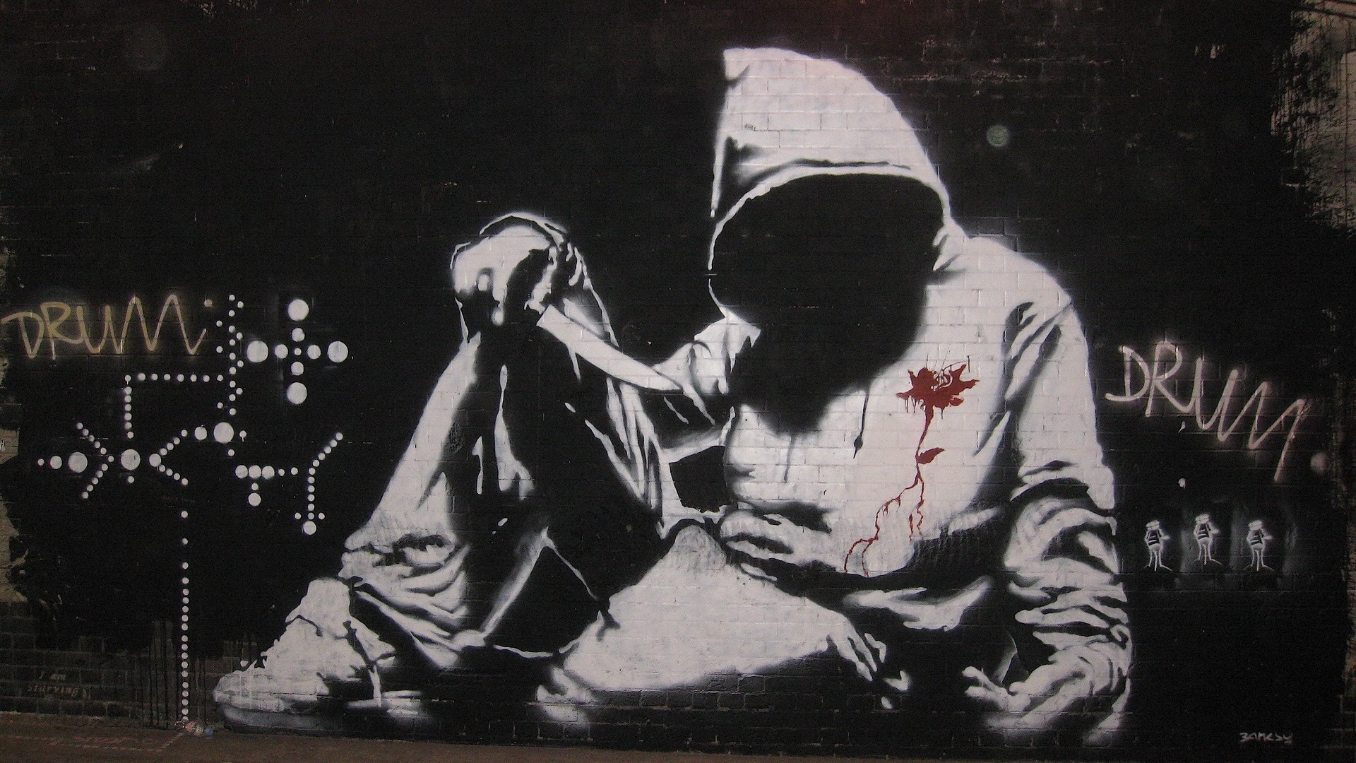 Graffiti of a hooded figure with a knife and a rose HD Wallpaper