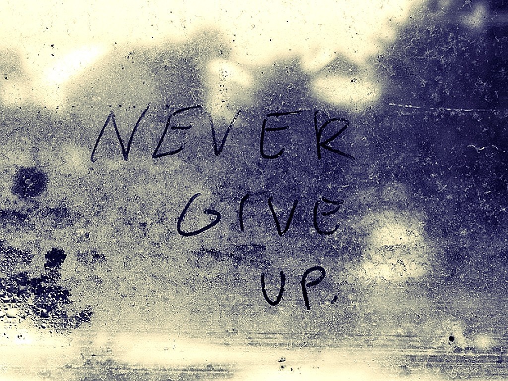 Text on a frosted window: Never give up HD Wallpaper
