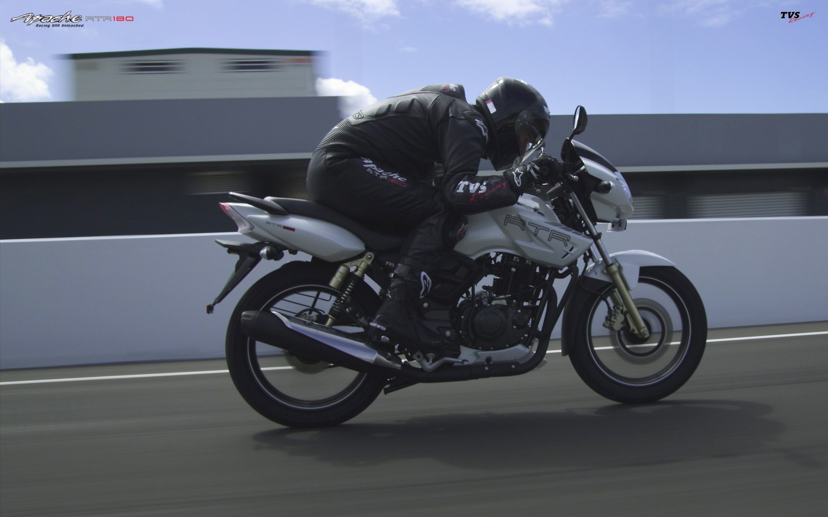 TVS Apache RTR 180 motorcycle with rider HD Wallpaper