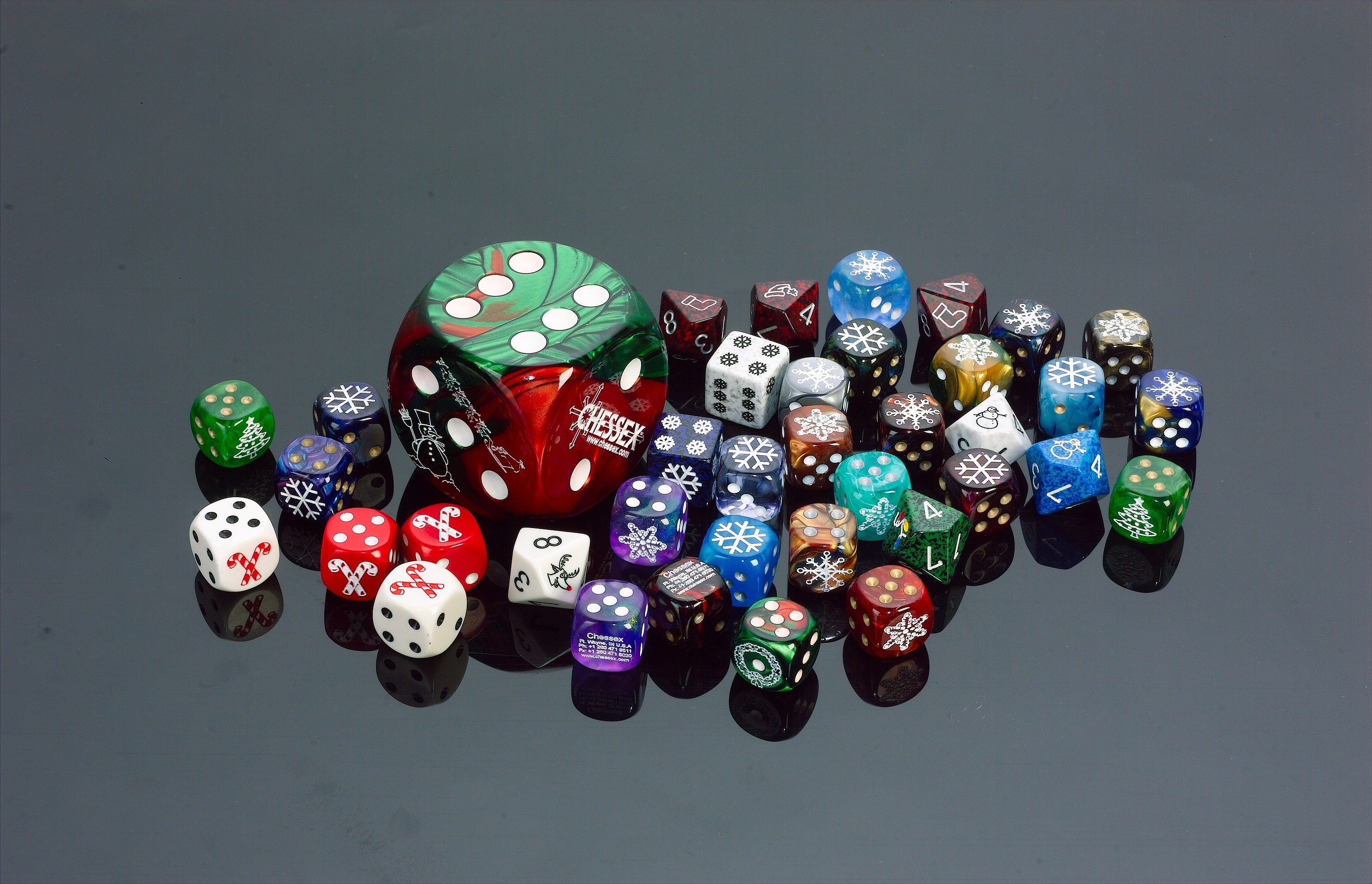 Collection of Chessex dice with holiday themes HD Wallpaper