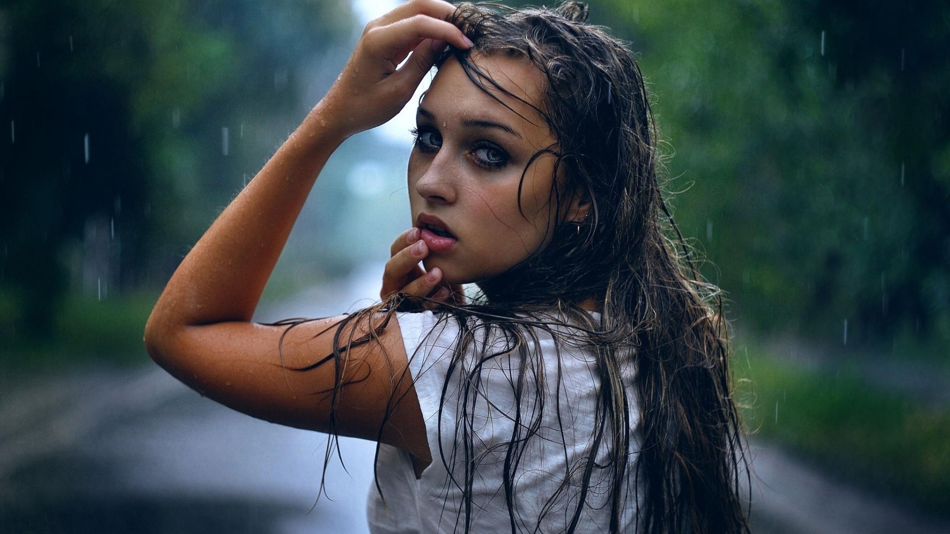 Woman with wet hair in the rain HD Wallpaper