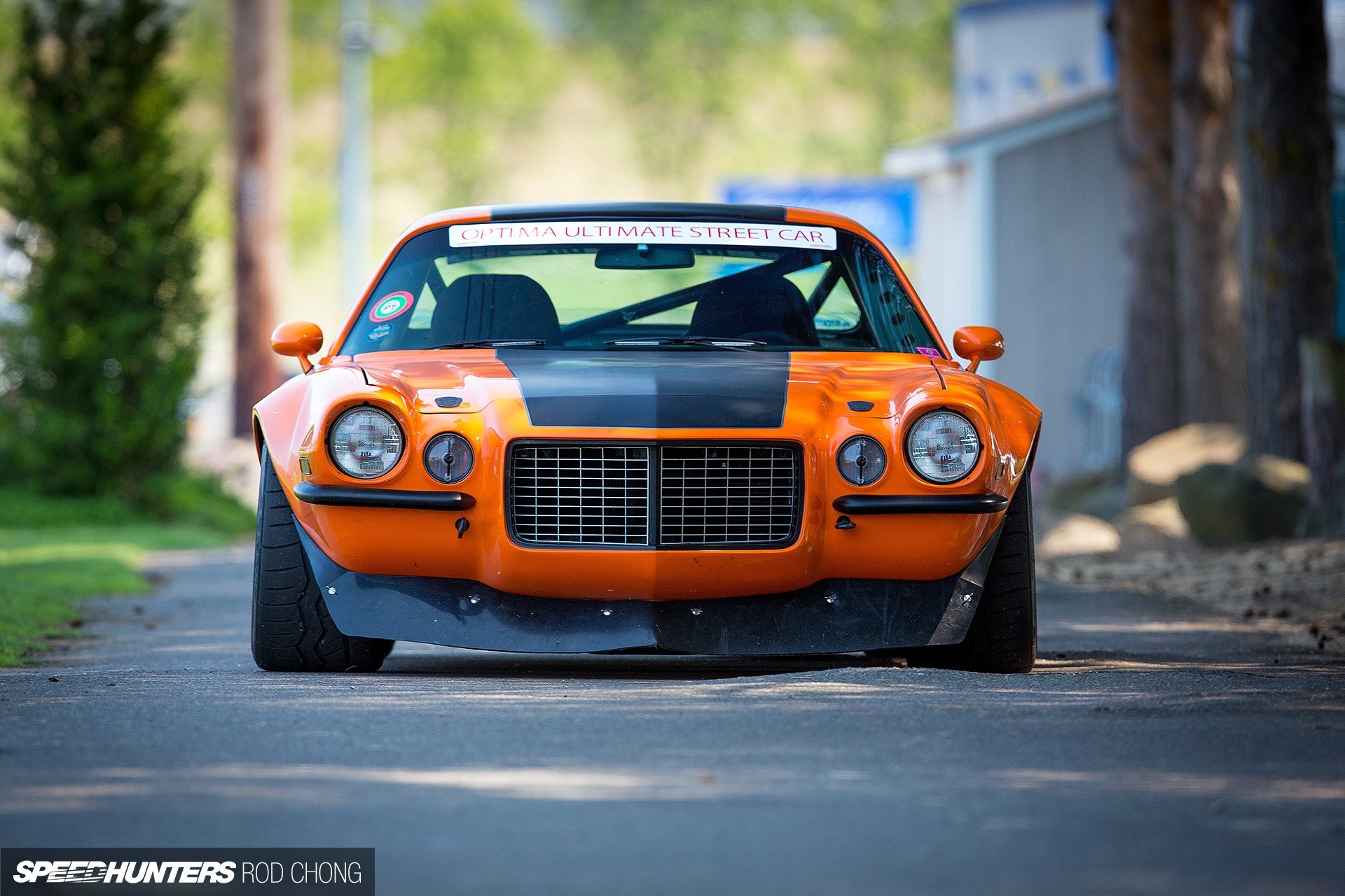 Orange Chevrolet Camaro race car with black stripe HD Wallpaper