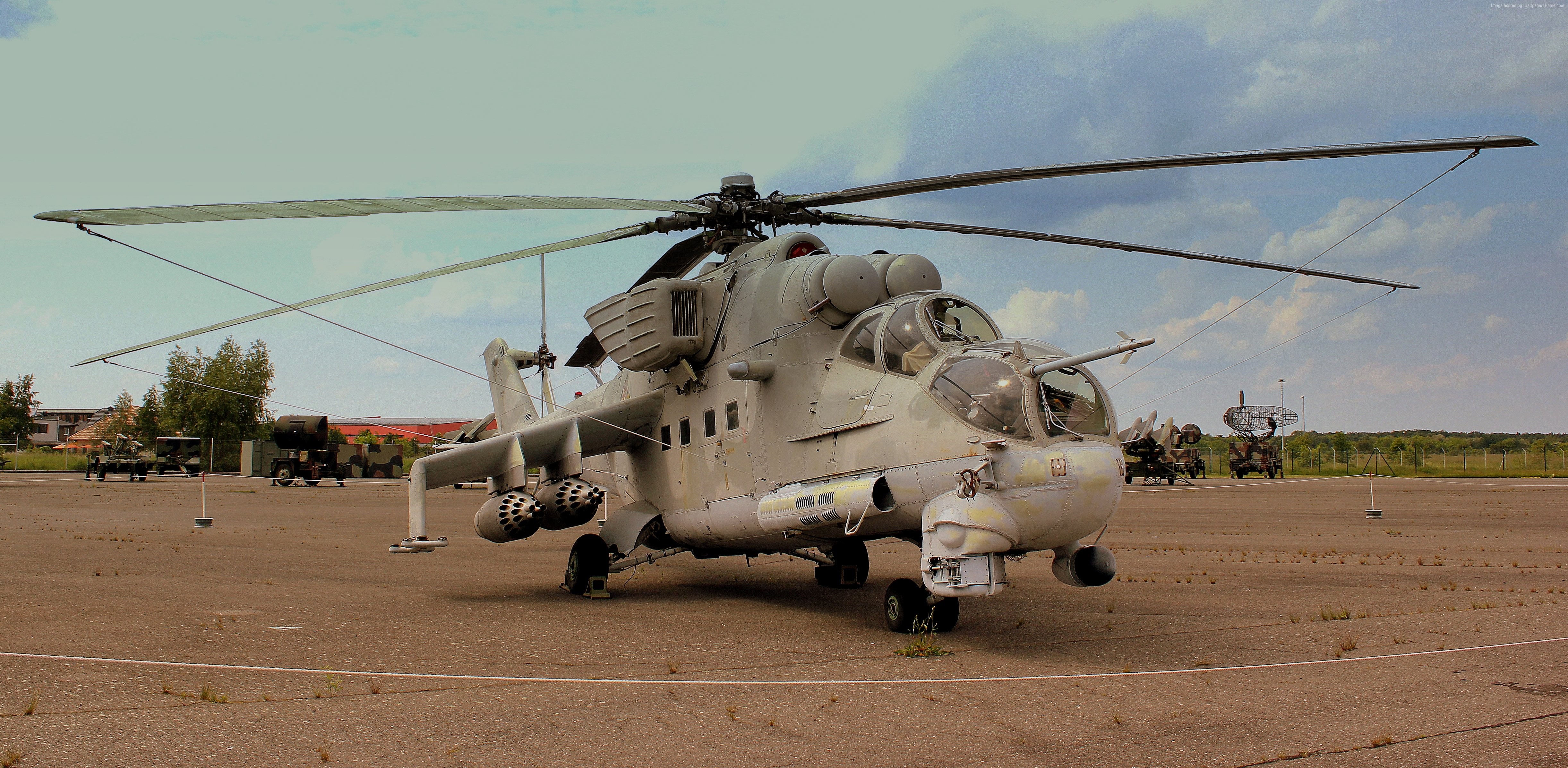 Mil Mi-24 Hind attack helicopter on tarmac HD Wallpaper