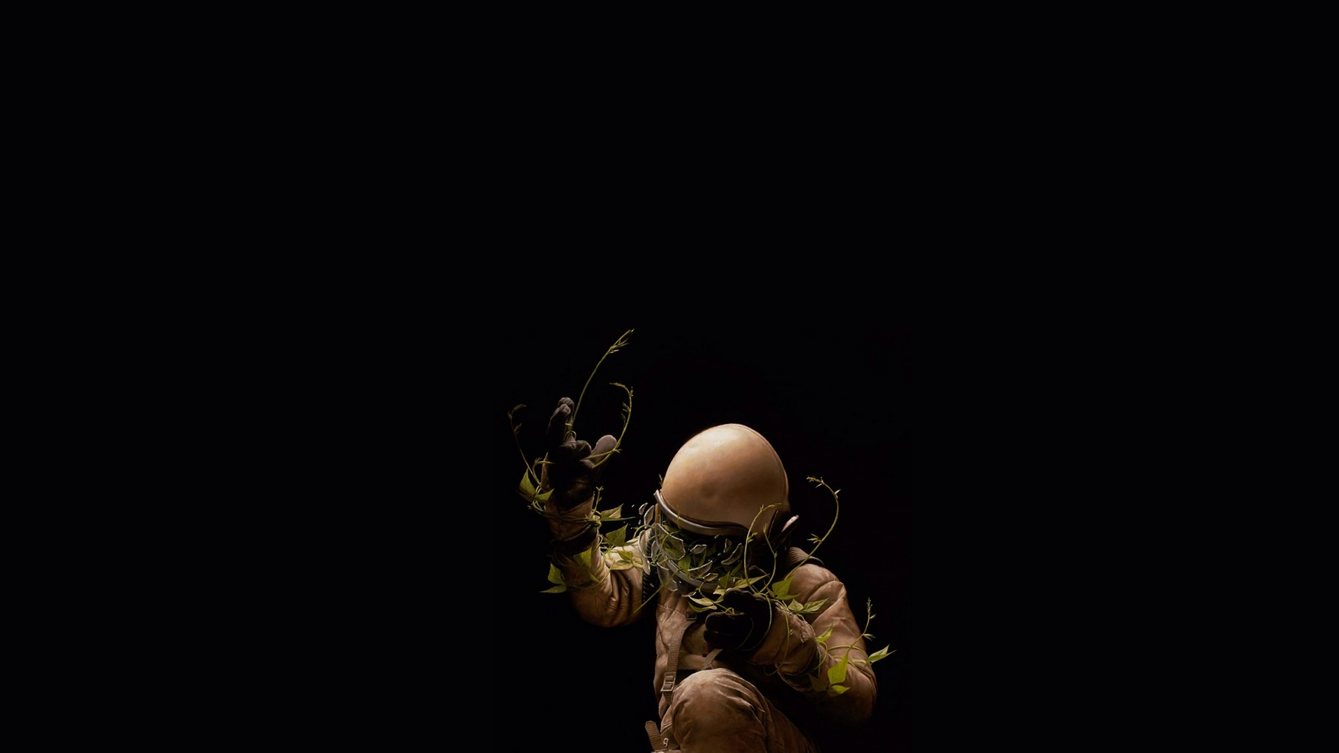 Astronaut covered in vines in darkness HD Wallpaper