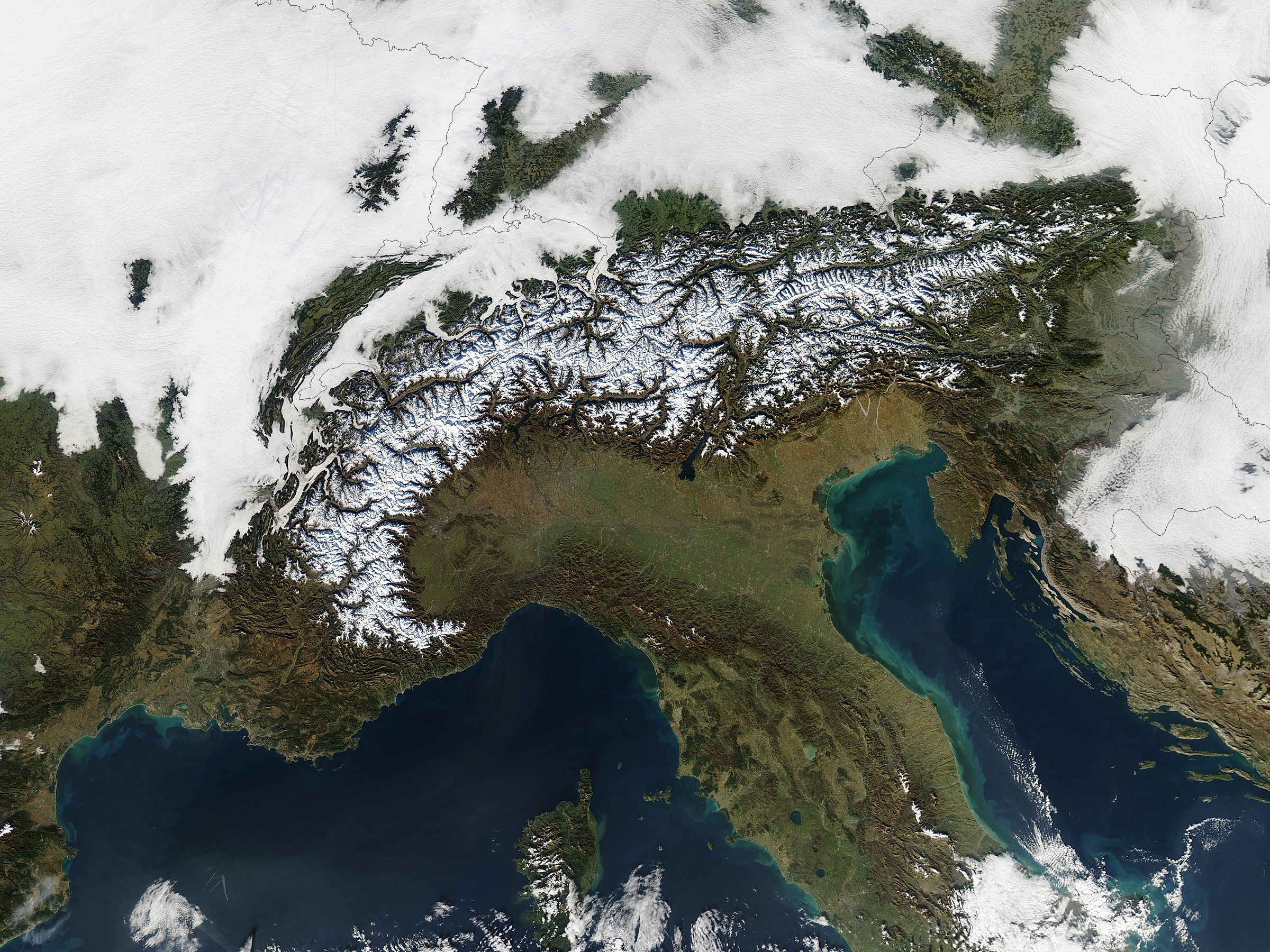 Satellite view of the Alps with snow and clouds HD Wallpaper