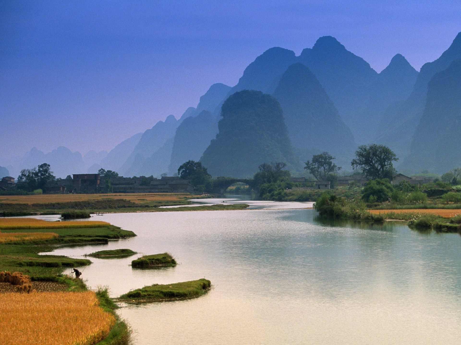 Misty mountains and river valley with rice fields HD Wallpaper