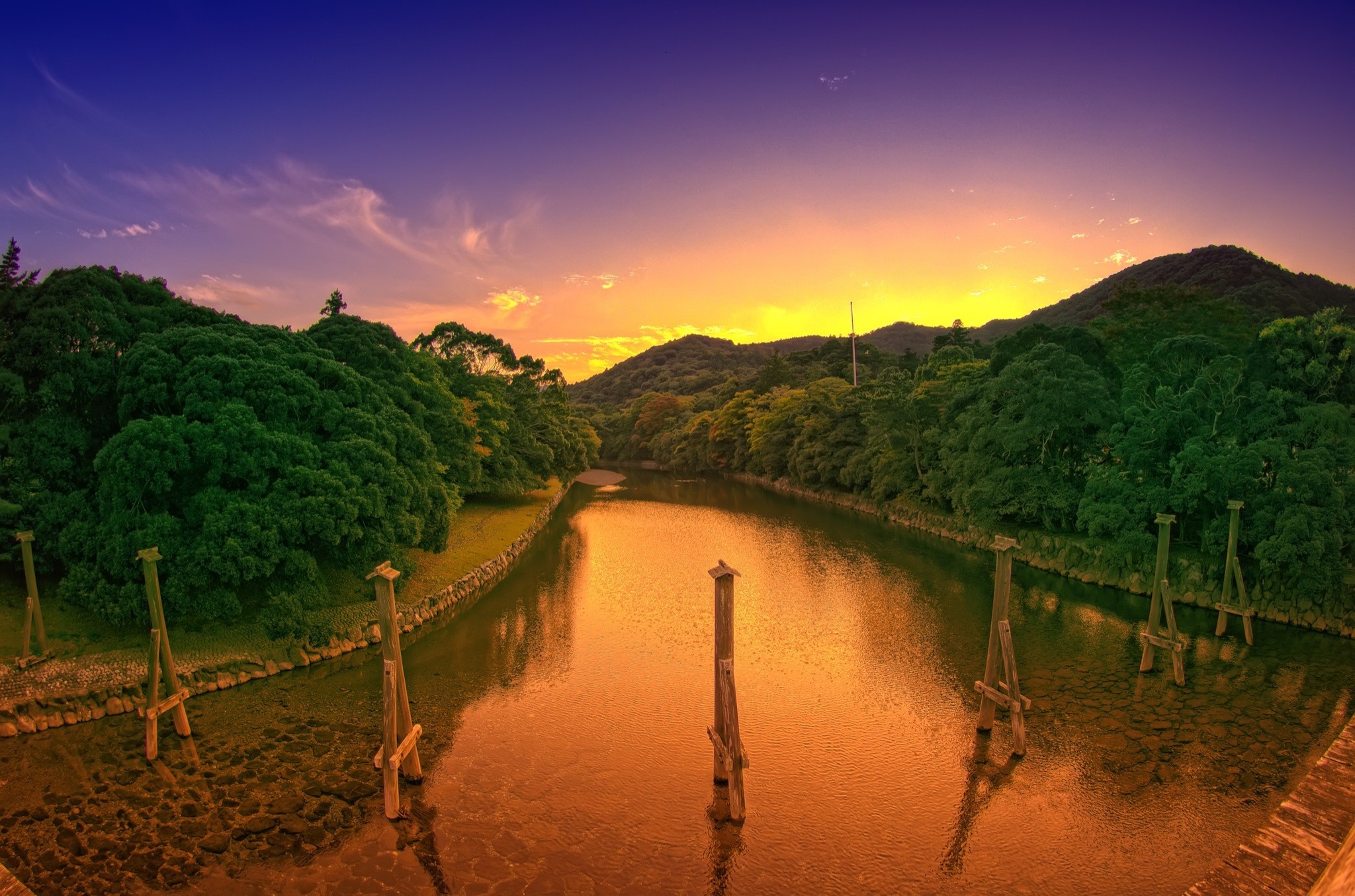 River landscape at sunset with trees and hills HD Wallpaper