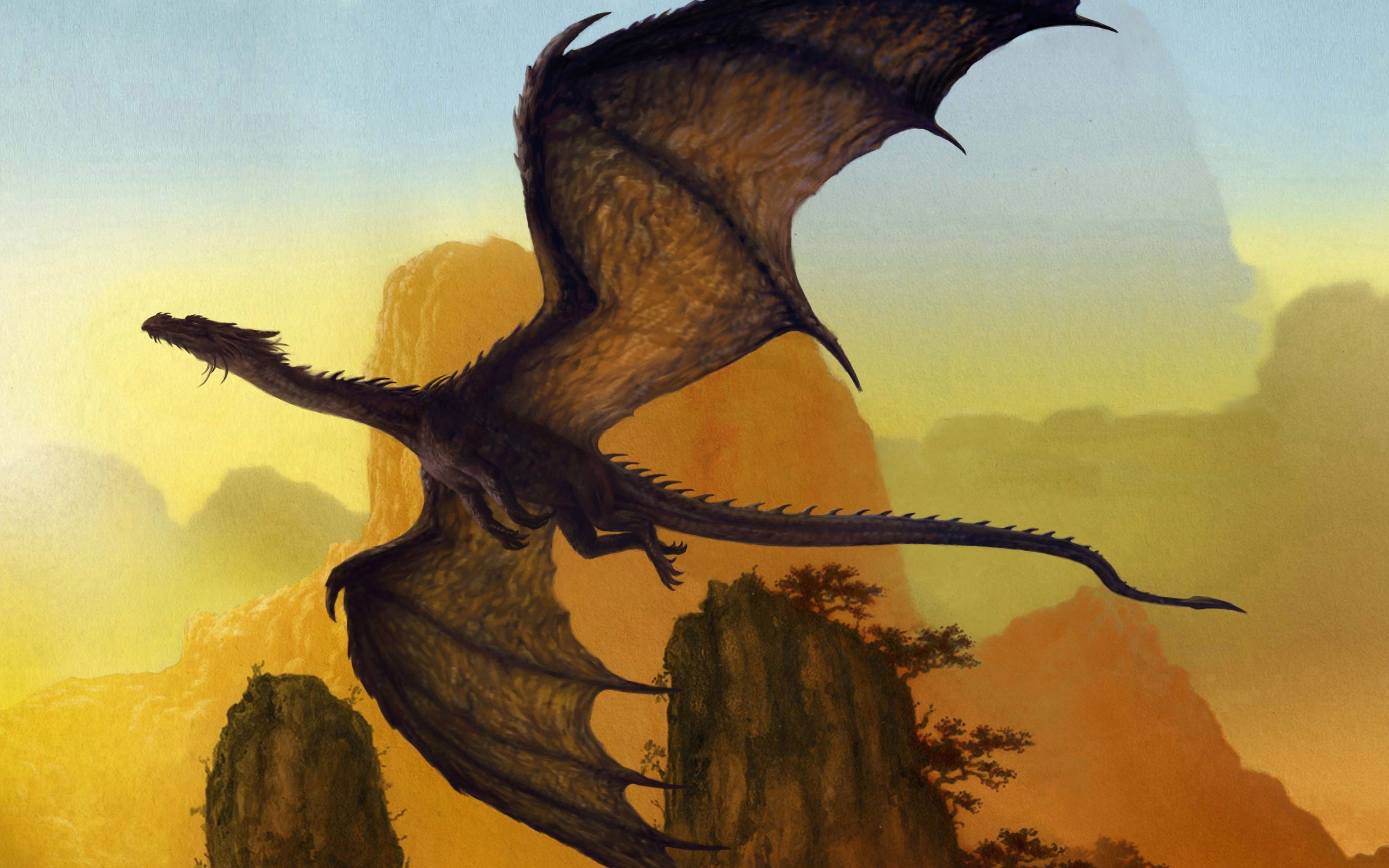 Dragon flying over rocky mountains at sunset HD Wallpaper