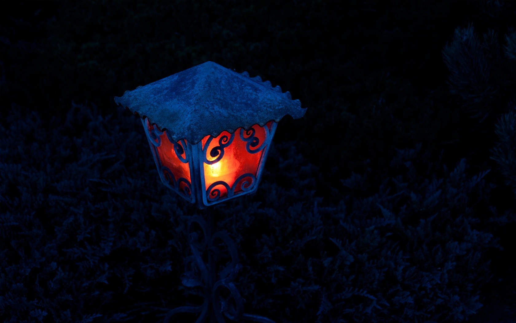 A glowing lantern in the dark HD Wallpaper