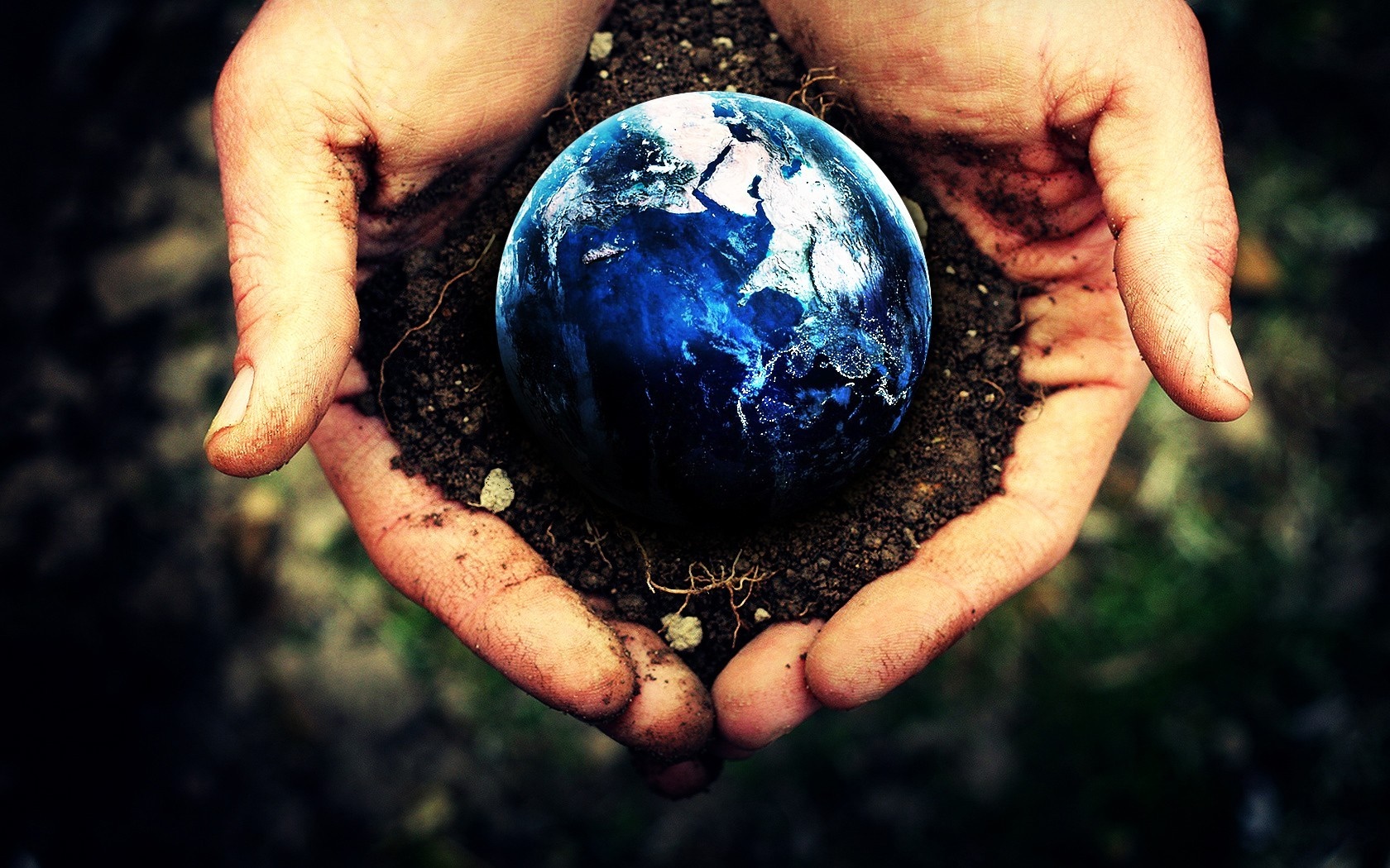 Hands holding the Earth in soil HD Wallpaper