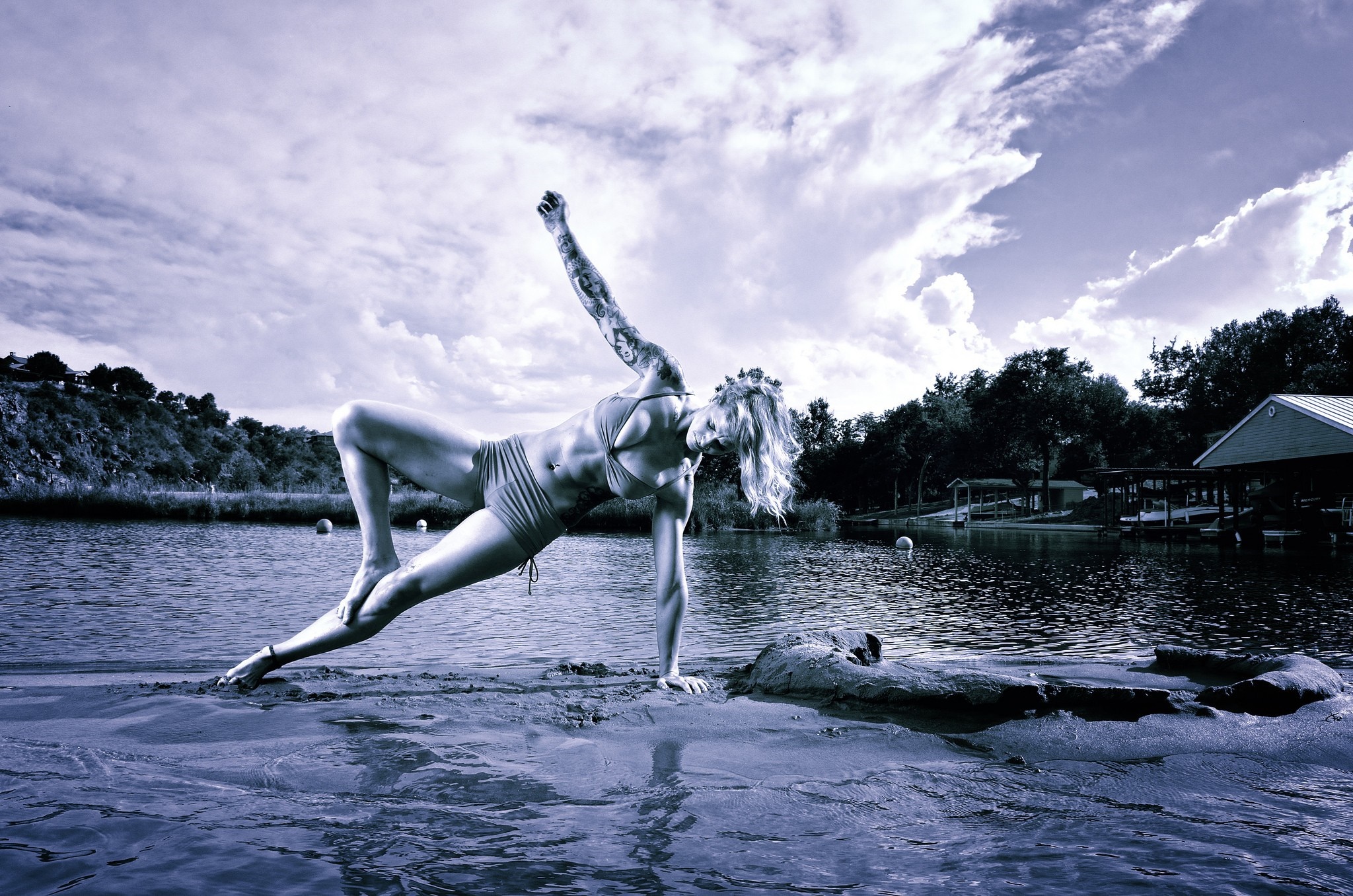 Woman performing yoga on a body of water HD Wallpaper
