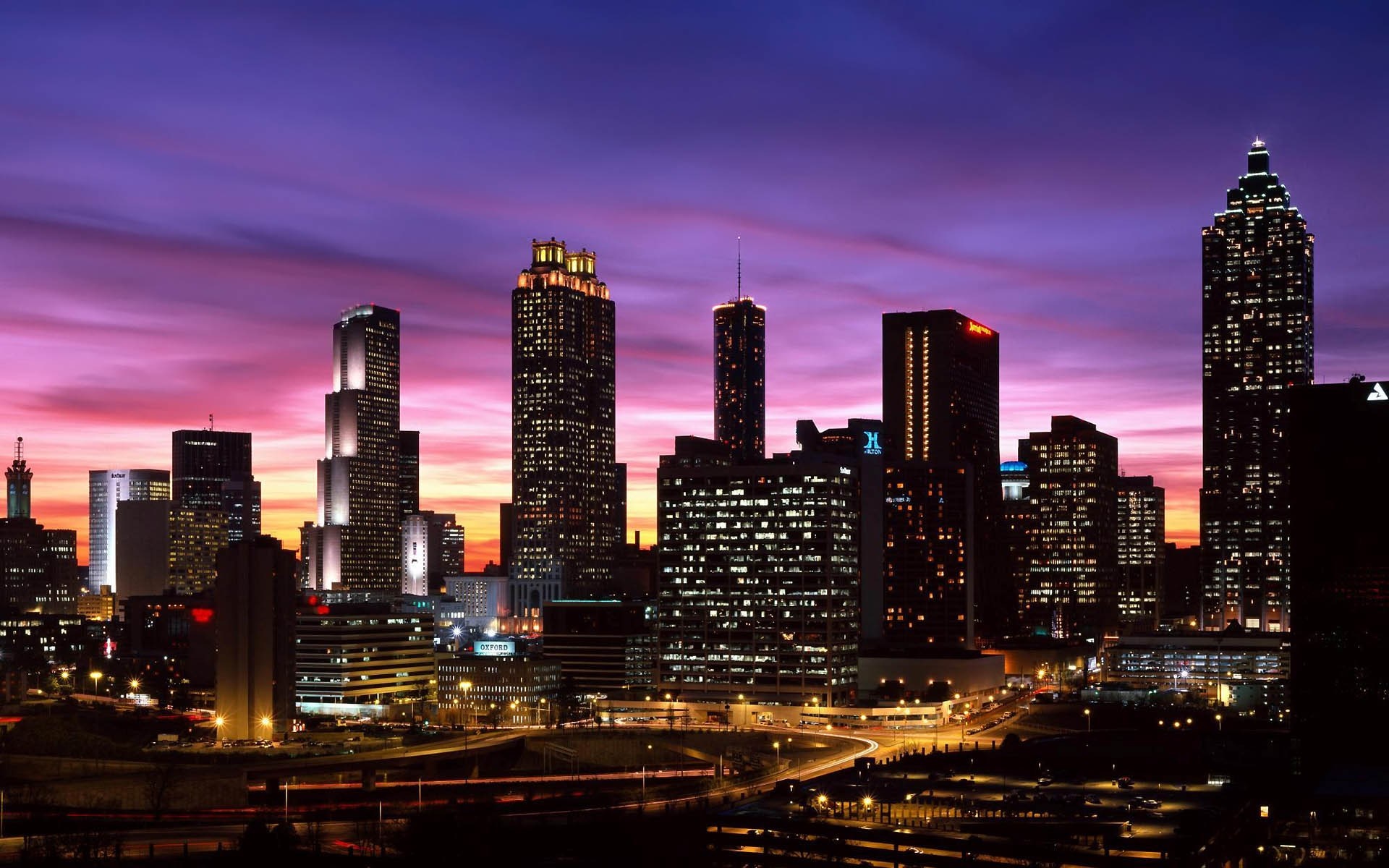 Atlanta skyline at sunset with purple and pink sky HD Wallpaper