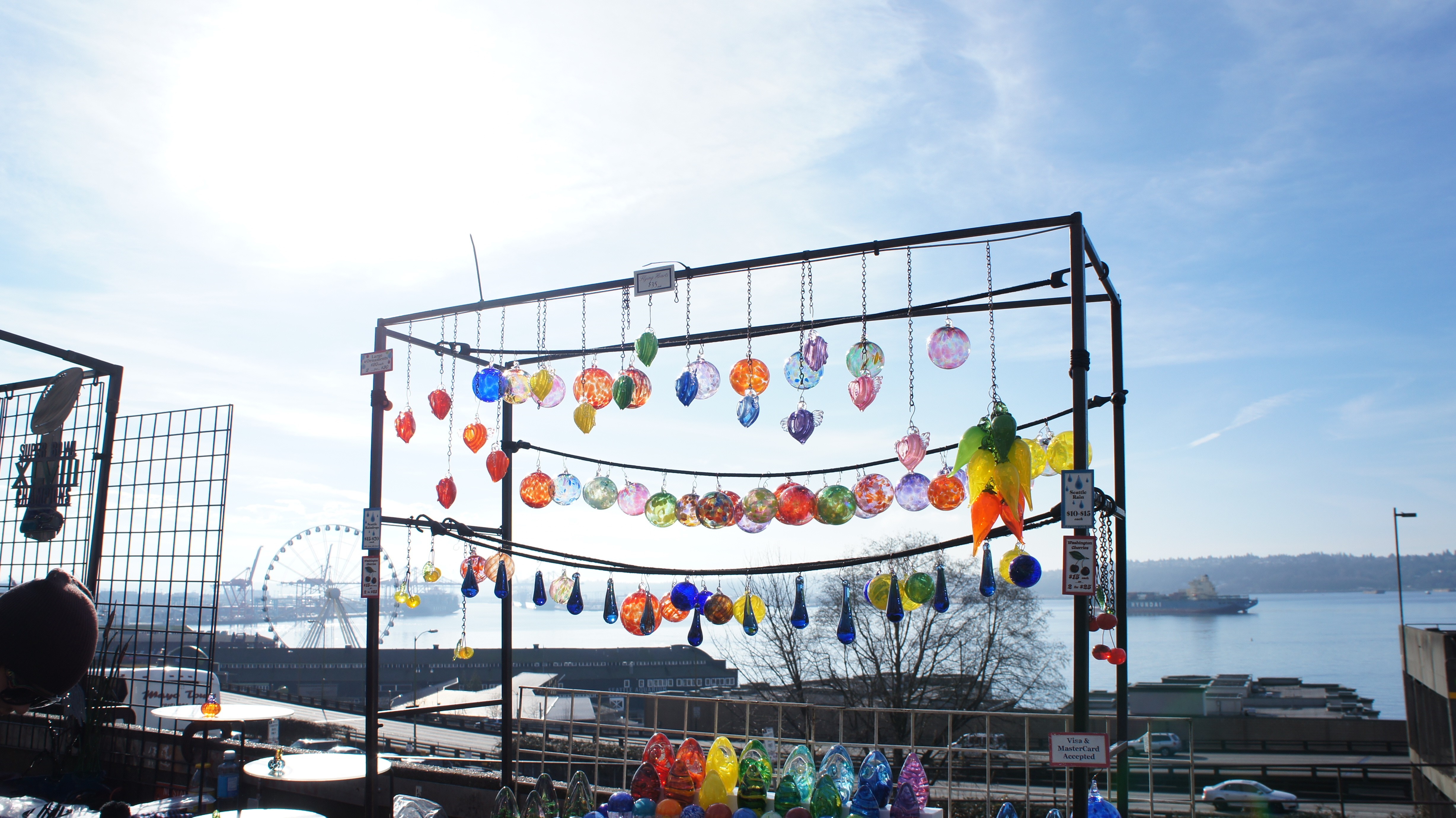 Seattle waterfront with glass ornaments and Ferris wheel HD Wallpaper