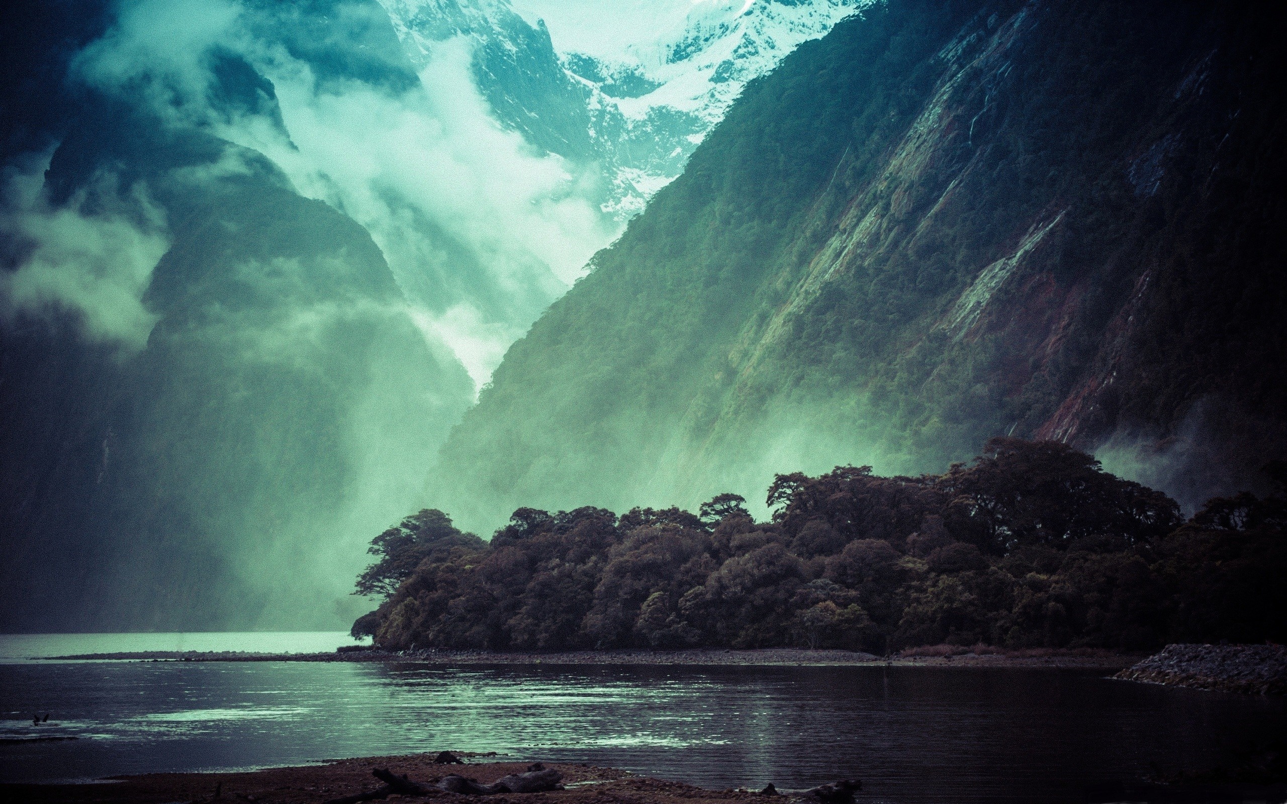 Misty mountains over a dark lake and forest HD Wallpaper