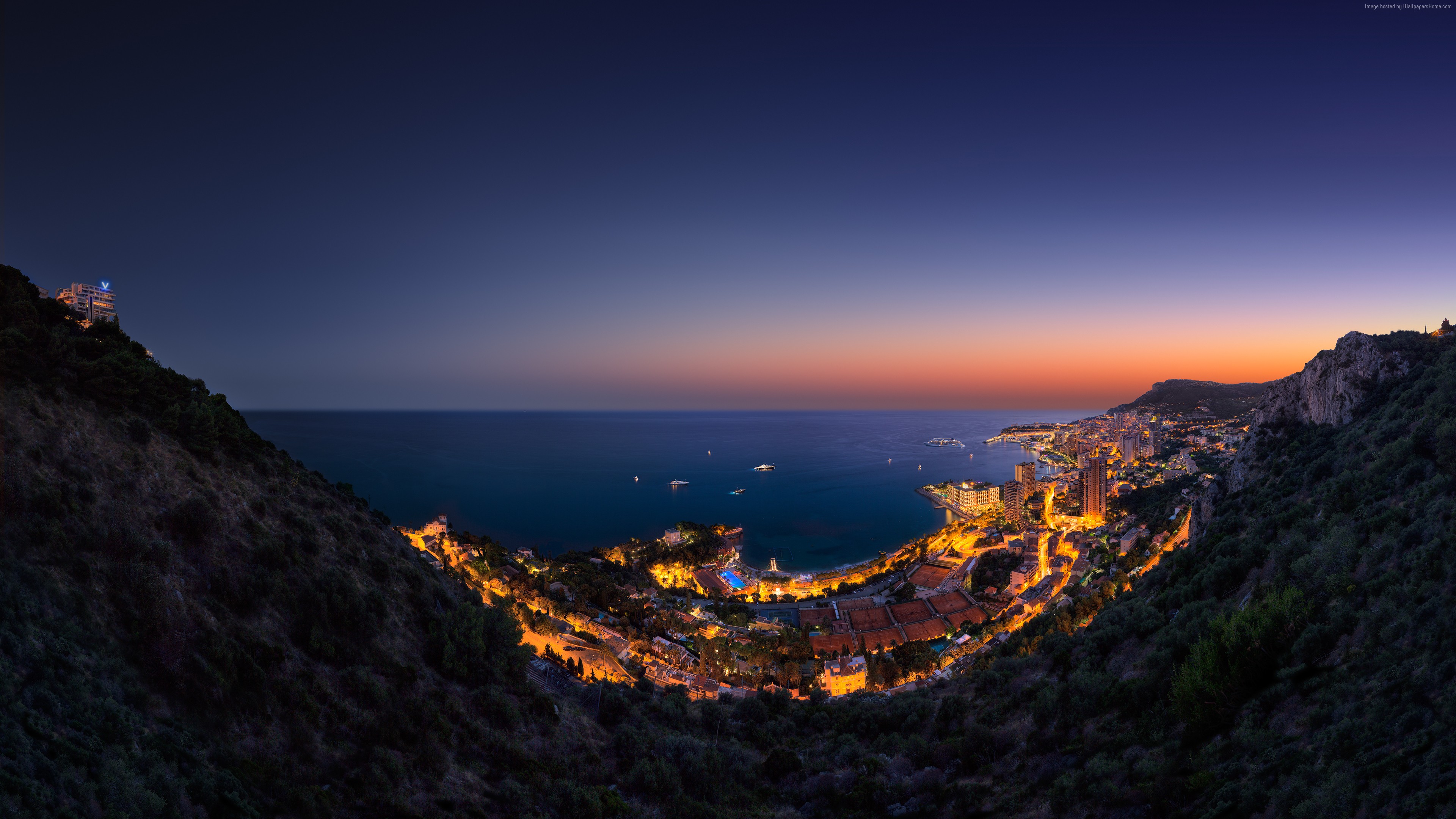 Monaco coastline at twilight with boats and city lights HD Wallpaper