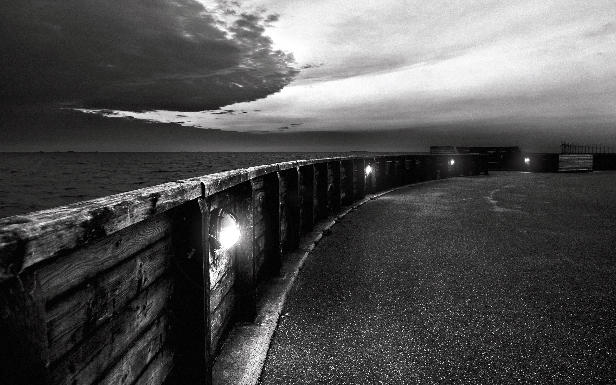 Wooden pier railing with lights at dusk HD Wallpaper