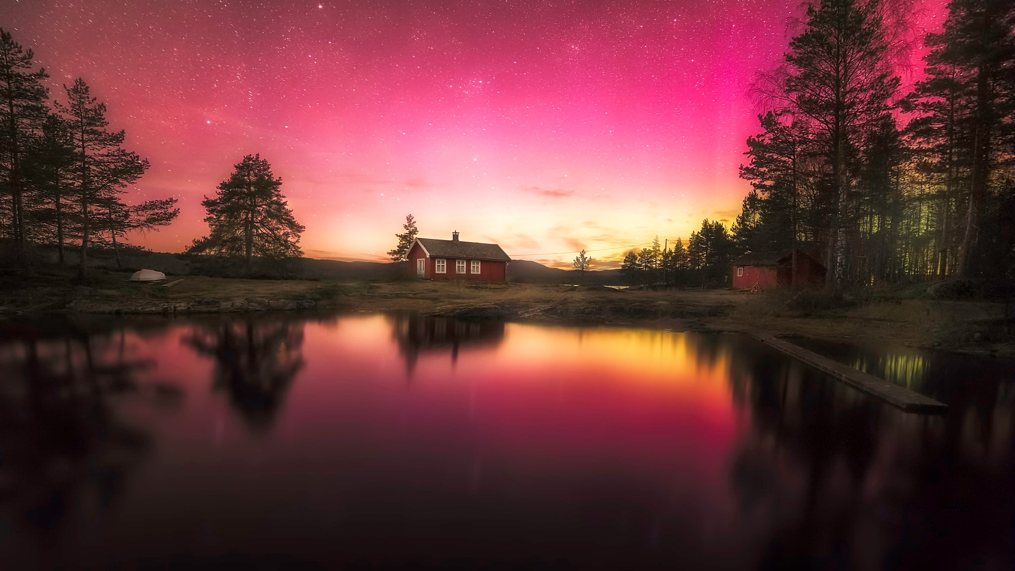 Red cabin by lake under aurora borealis HD Wallpaper