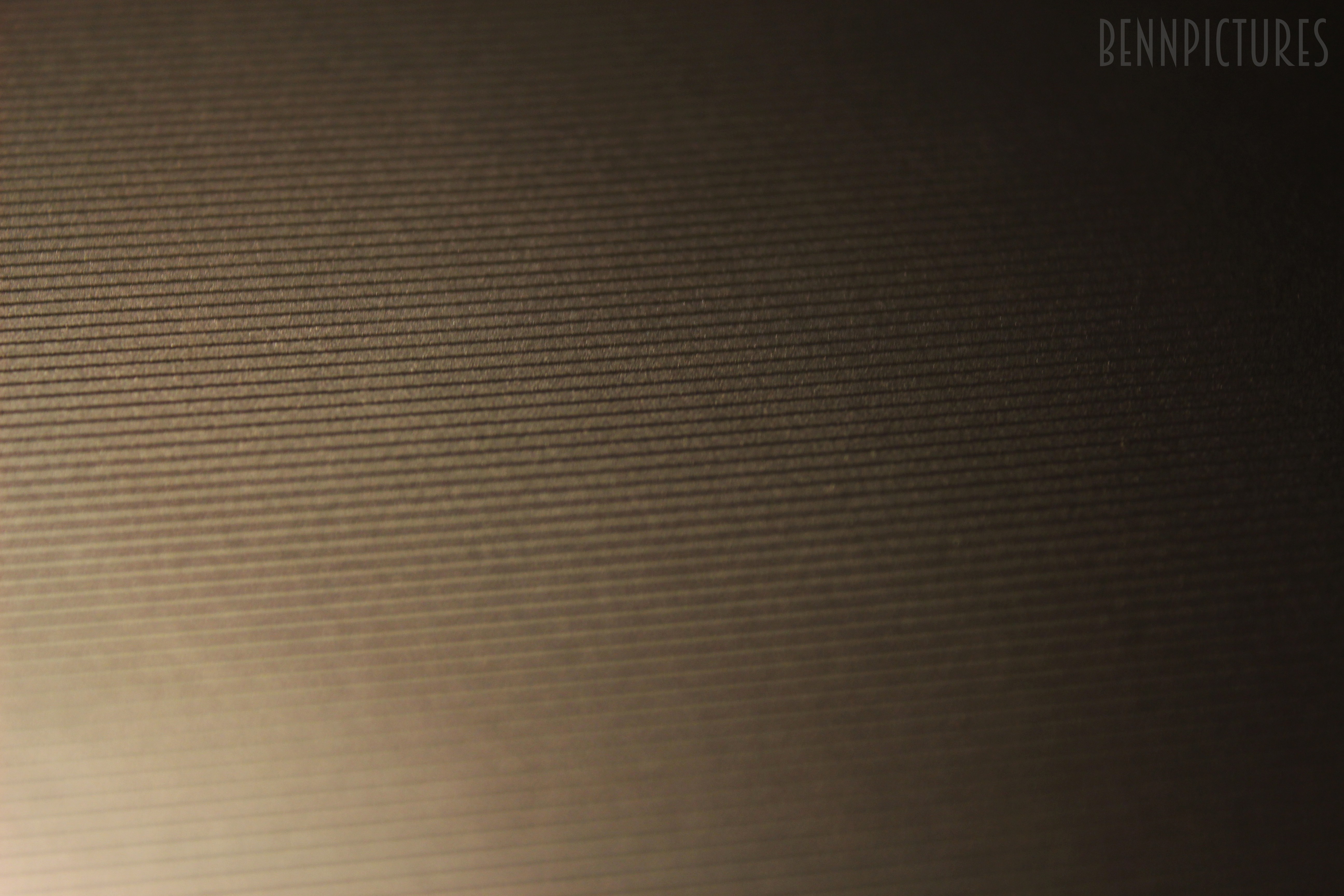 Textured surface with horizontal lines and light HD Wallpaper
