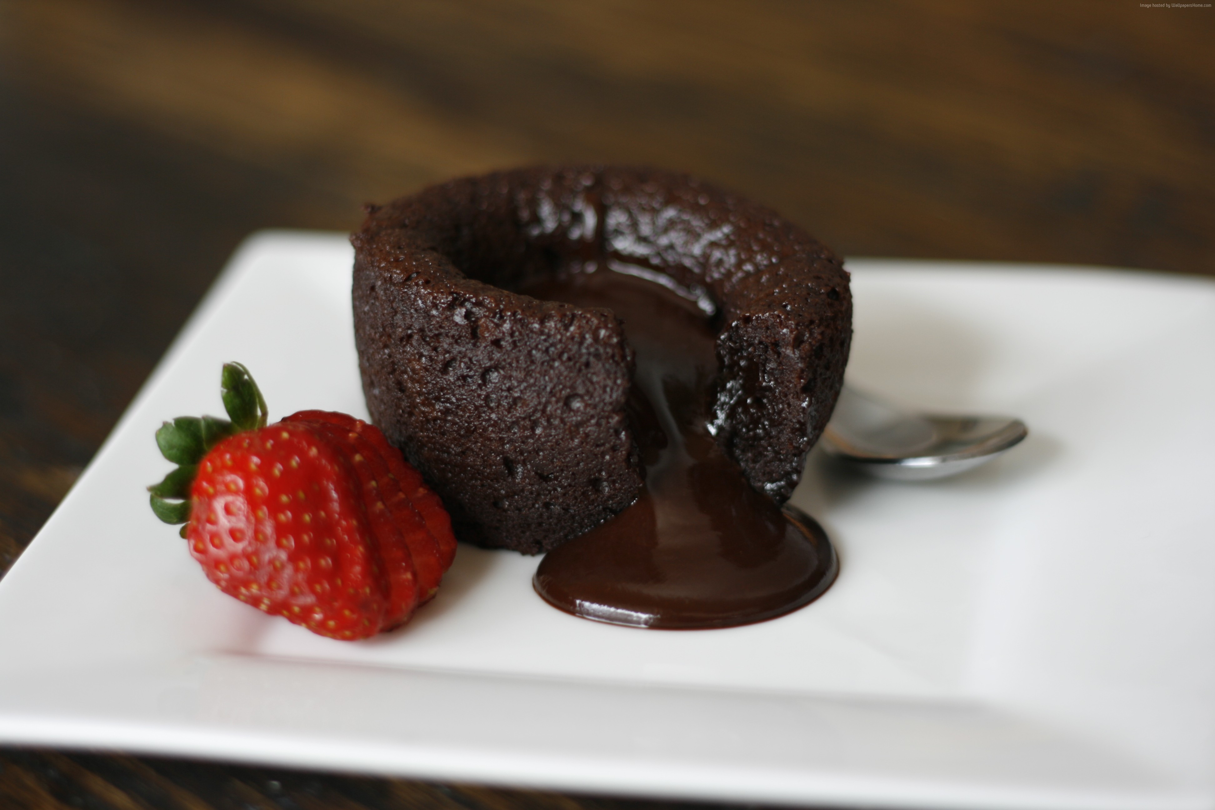 Chocolate lava cake with strawberry and spoon HD Wallpaper