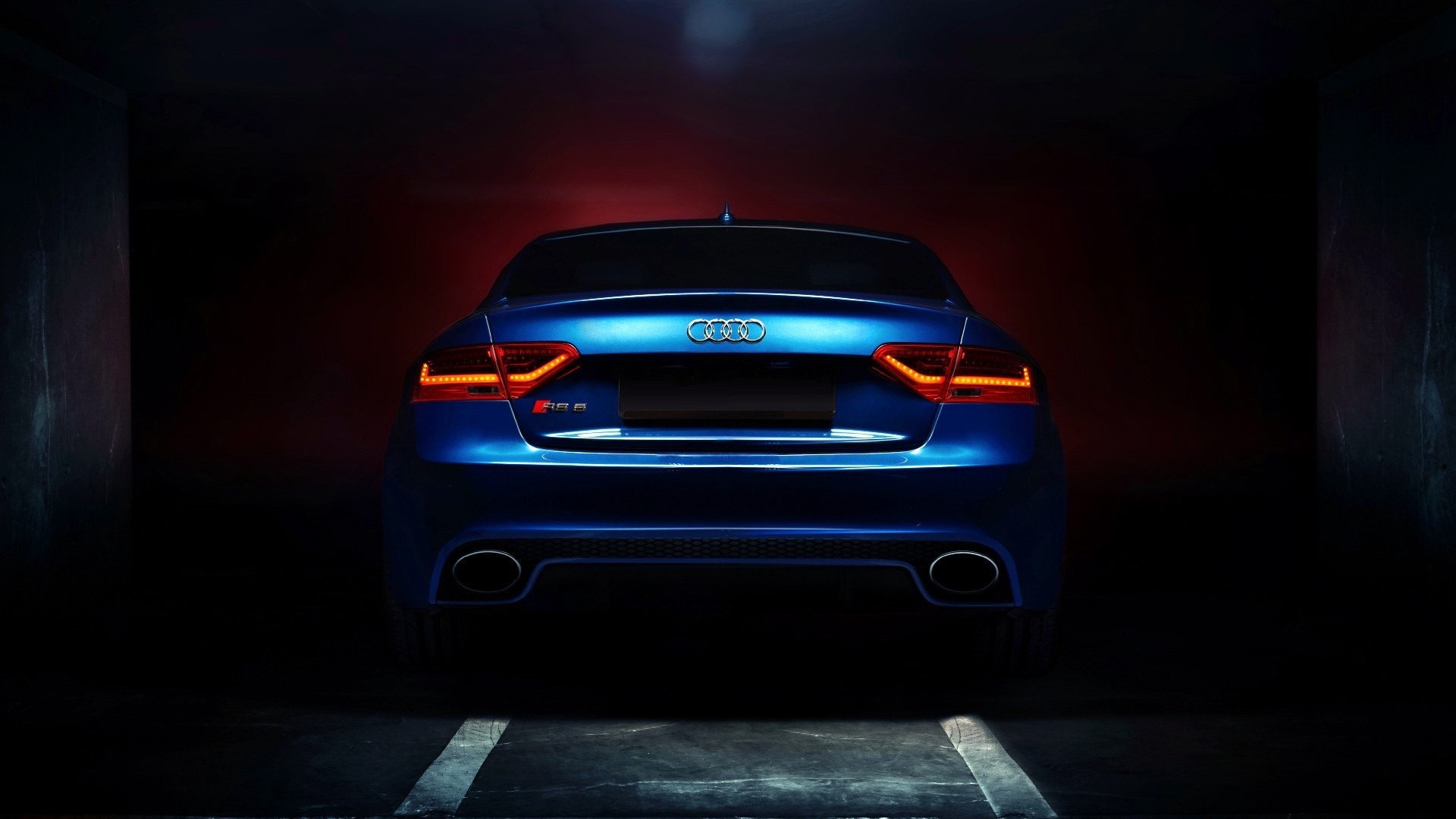 Blue Audi RS5 parked in a dark garage HD Wallpaper