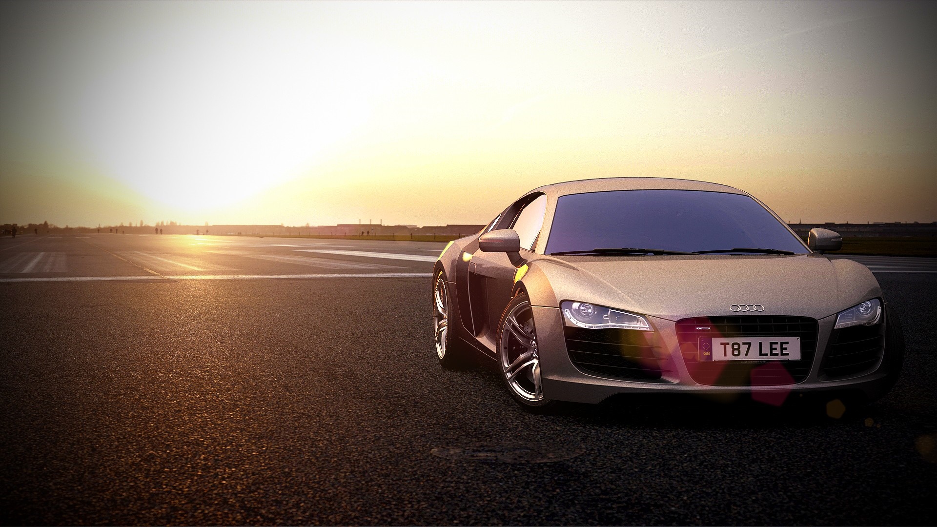 Audi R8 sports car on an airfield at sunset HD Wallpaper