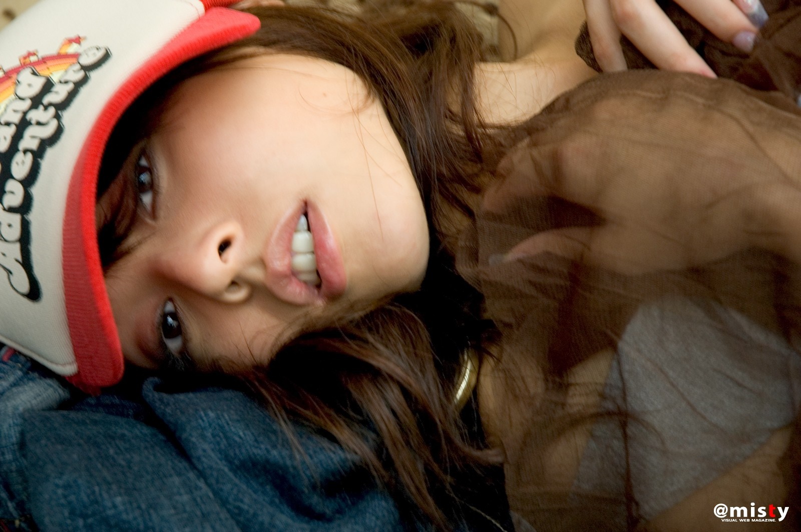 Reina Nakamata wearing a trucker hat and brown top HD Wallpaper