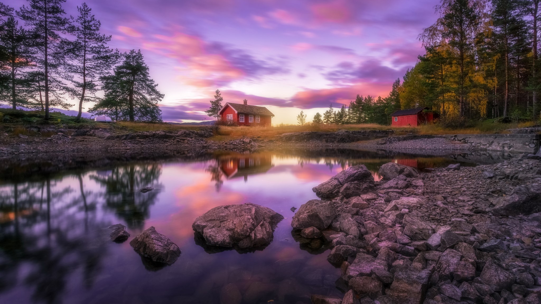 Red houses by a lake at sunset HD Wallpaper