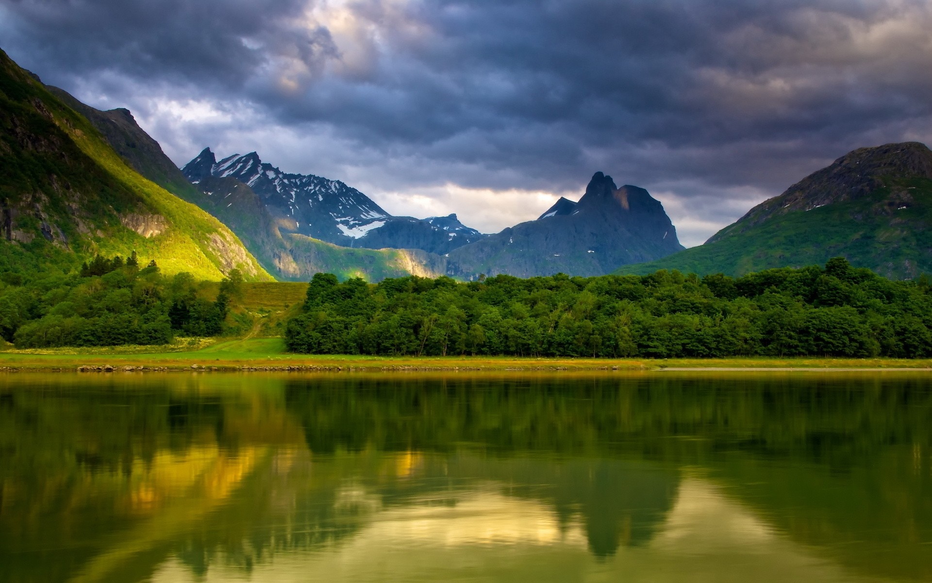 Serene Mountain Lake with Forest and Dramatic Sky HD Wallpaper