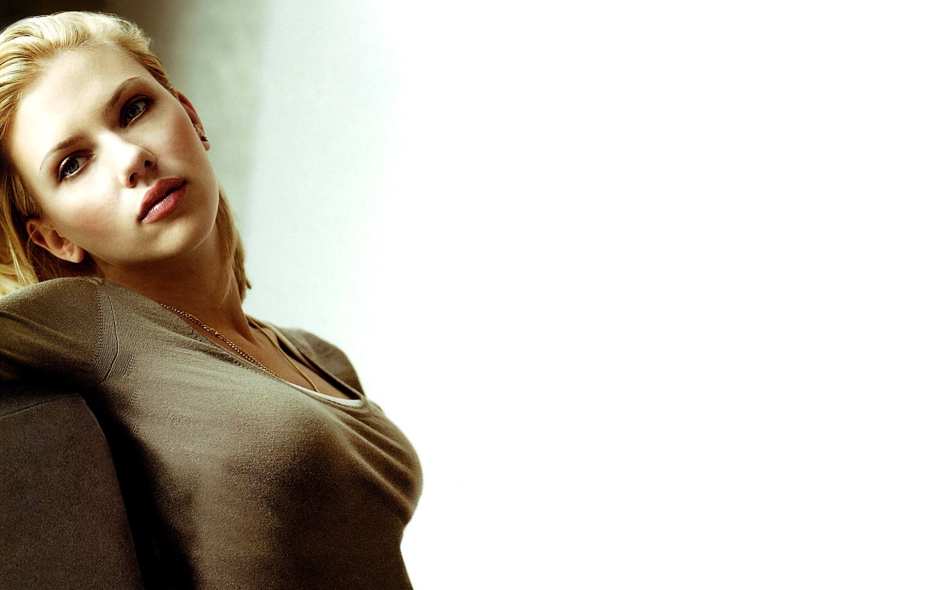 Scarlett Johansson posing for a photo shoot HD Wallpaper