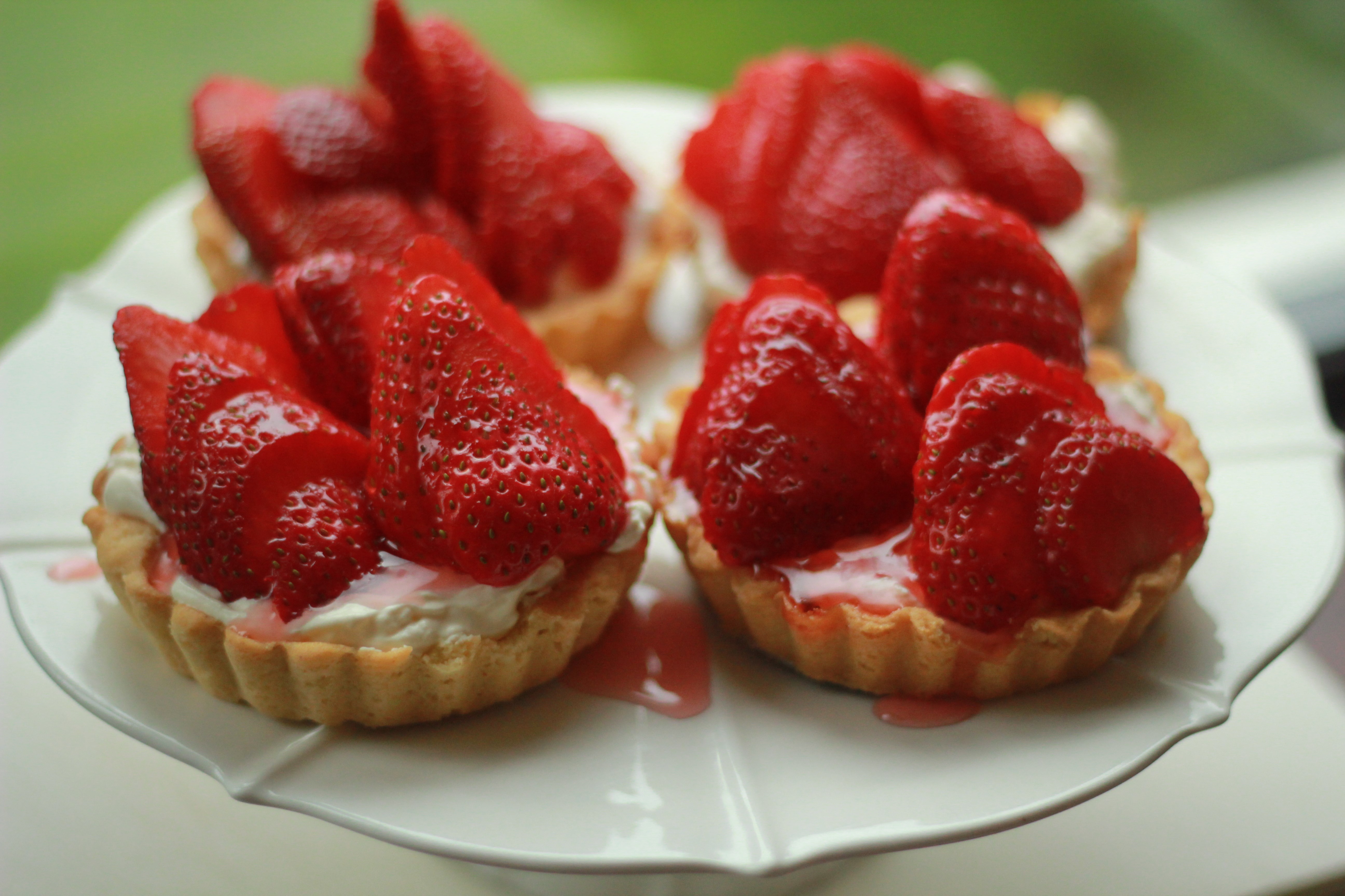 Strawberry tarts on a white cake stand HD Wallpaper
