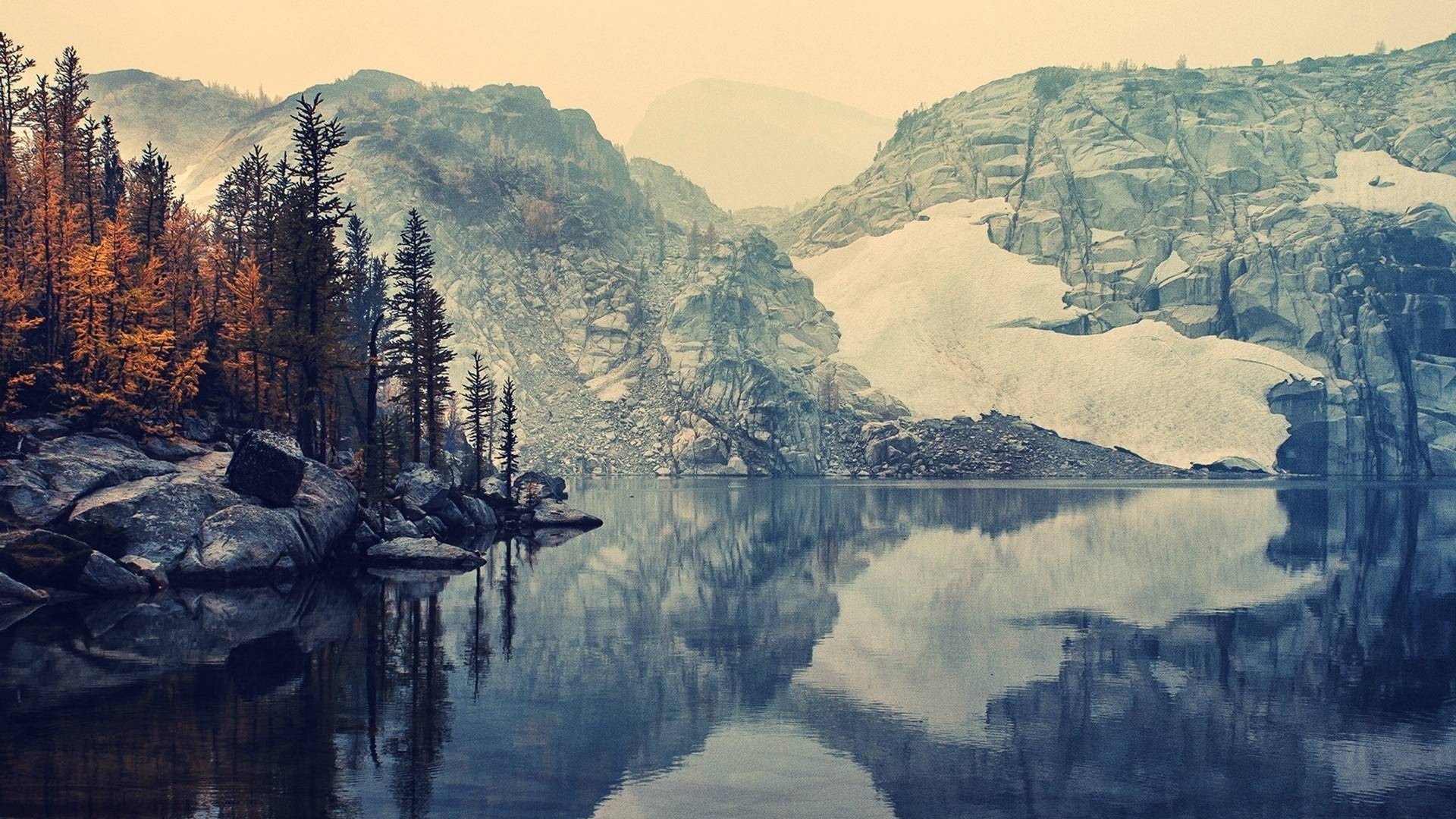 Mountain lake with autumn trees and snow-capped peaks HD Wallpaper