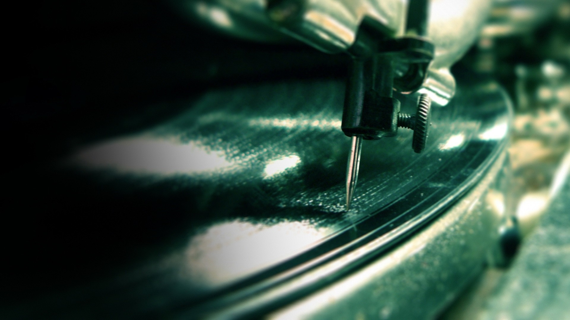 Close-up of a record player needle on a vinyl record HD Wallpaper