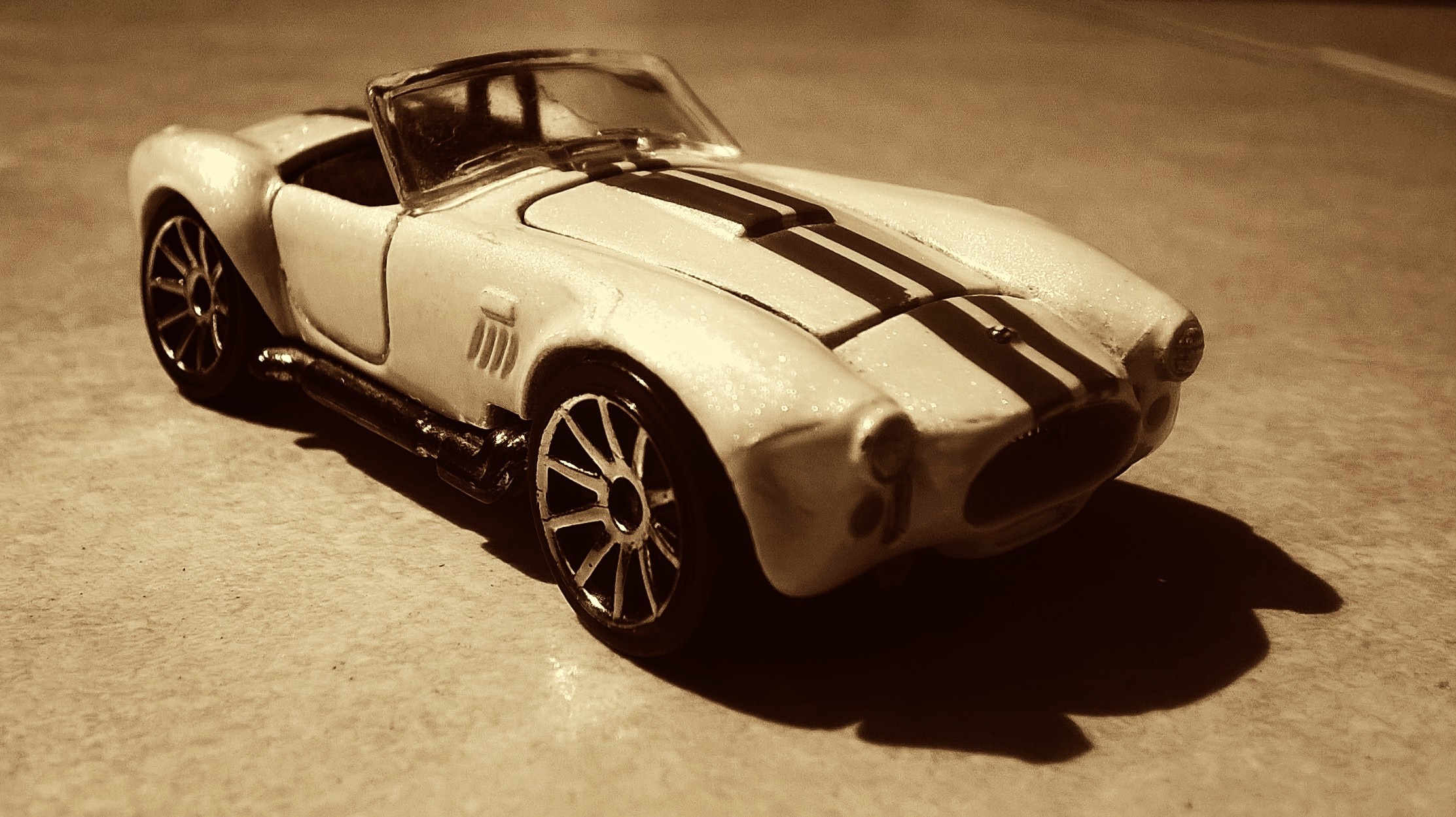White toy sports car with black stripes HD Wallpaper