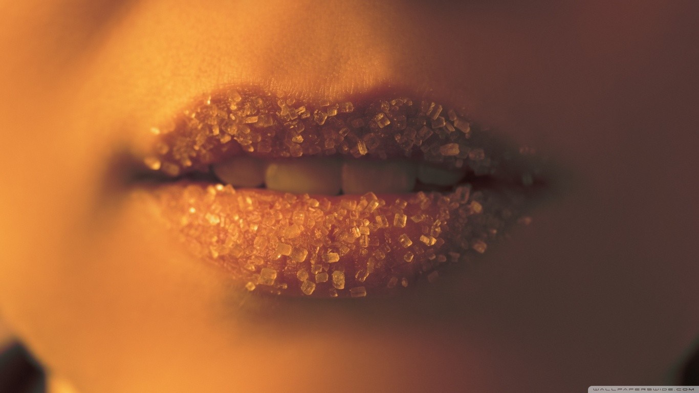 Close up of lips covered in sugar HD Wallpaper