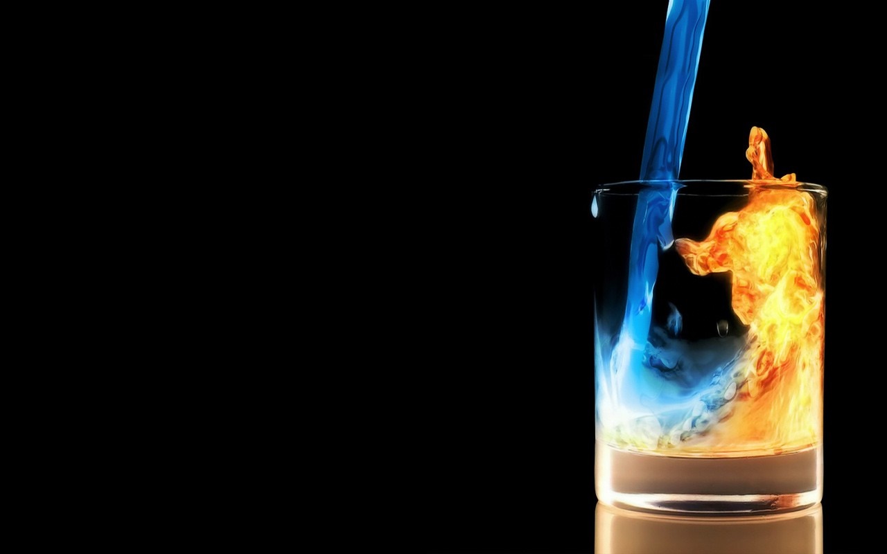 Blue liquid and fire in a glass HD Wallpaper