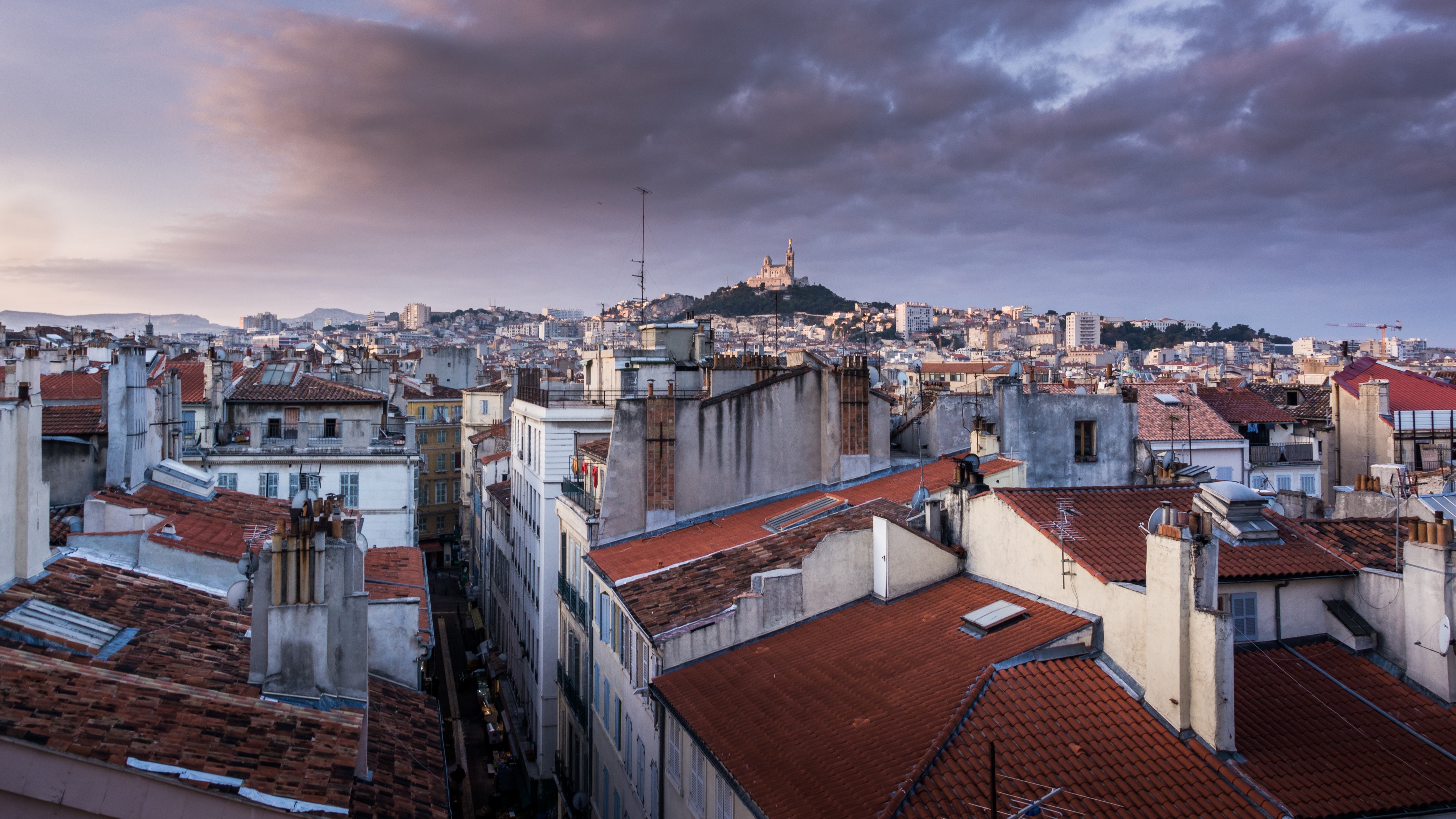 Marseille cityscape with Notre-Dame de la Garde basilica at sunrise HD Wallpaper