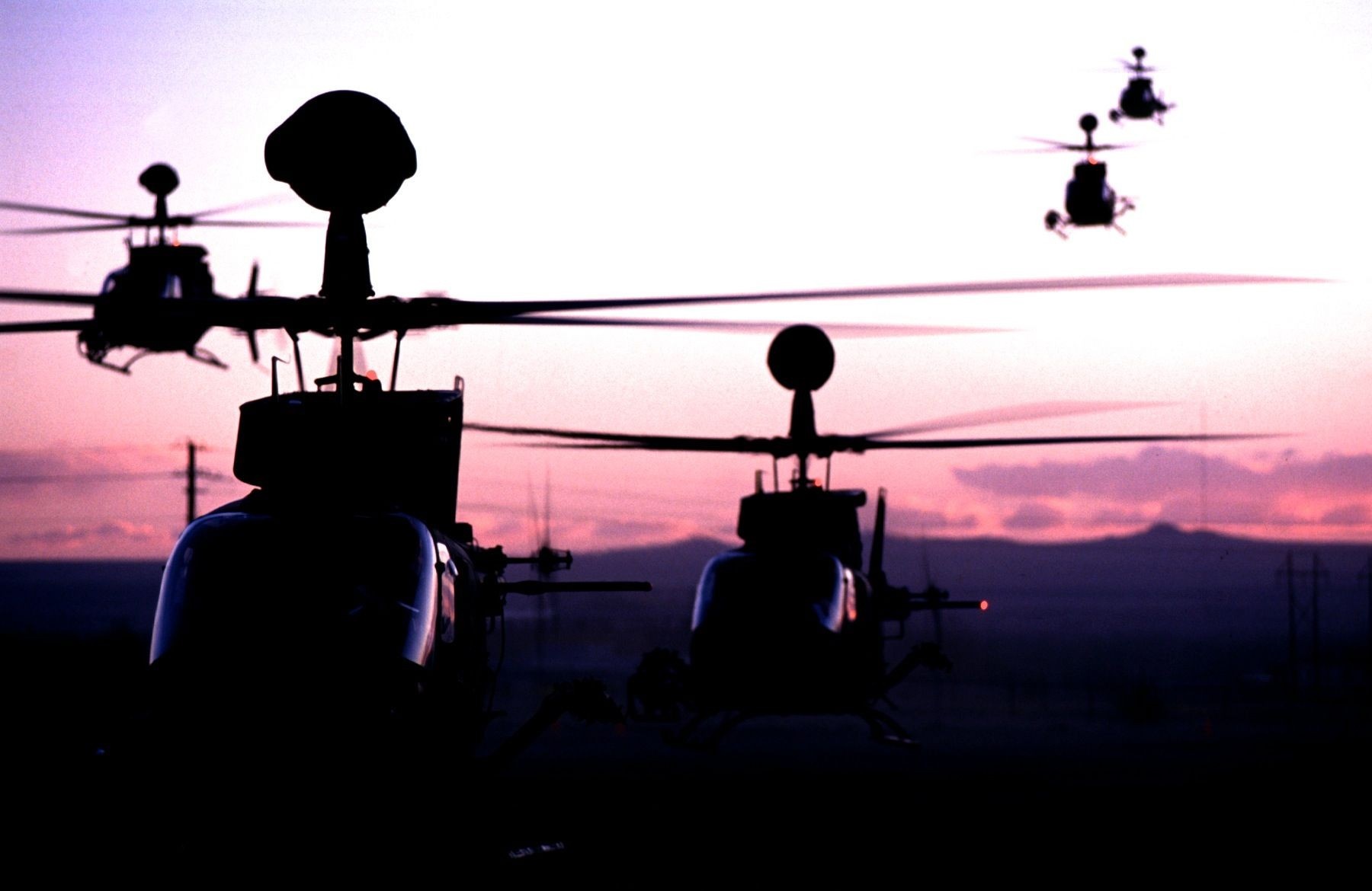 Silhouettes of helicopters flying at sunset HD Wallpaper