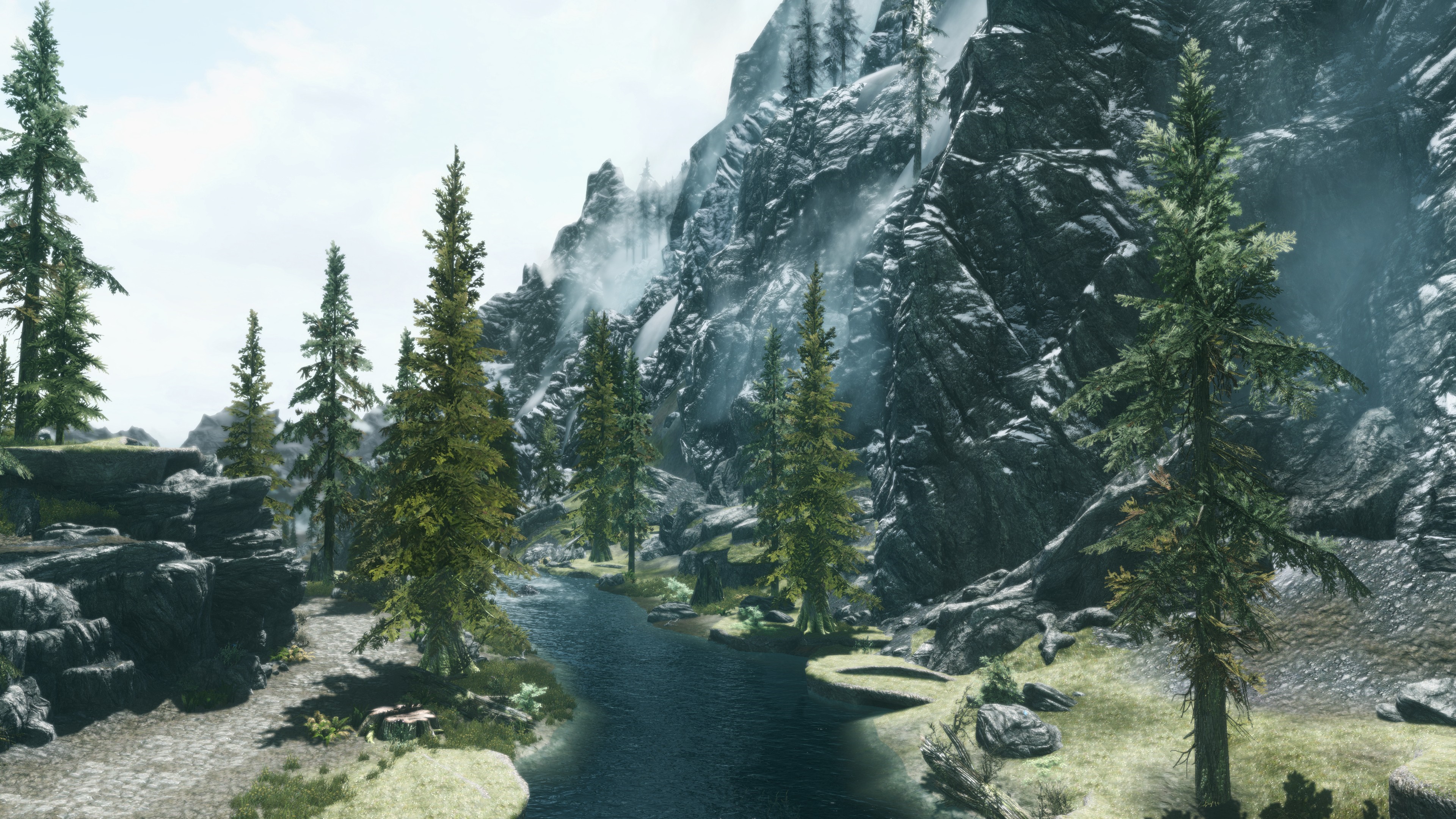 The Elder Scrolls V Skyrim landscape with river and mountains HD Wallpaper