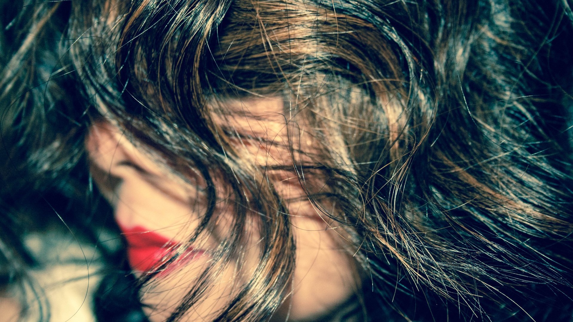 Close-up of a woman with red lipstick and brown hair HD Wallpaper