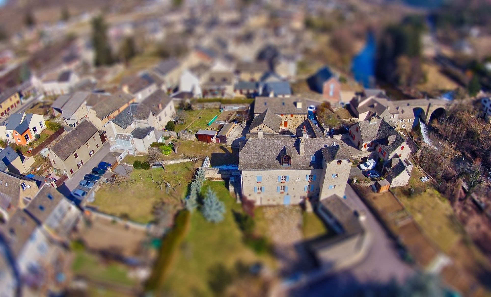 Aerial view of a European village with tilt-shift effect HD Wallpaper