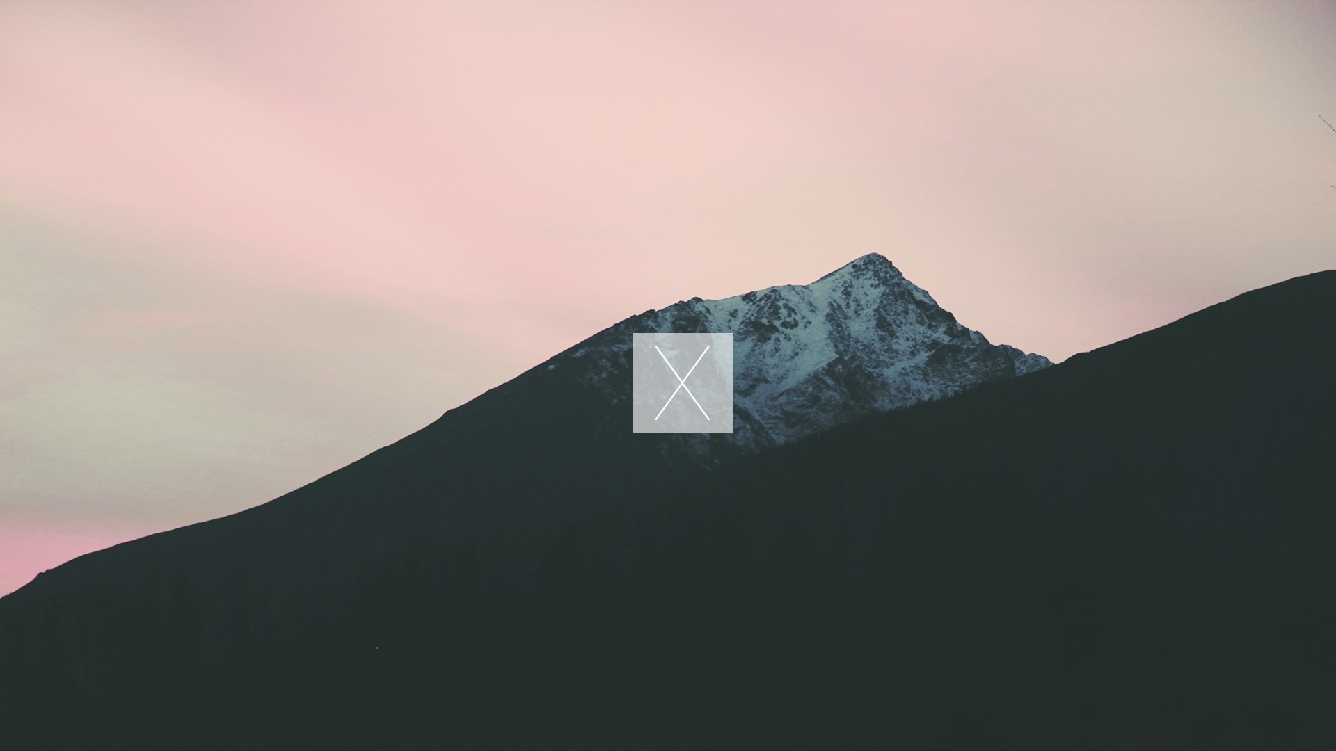Snow-capped mountain peak at dawn with pink sky HD Wallpaper