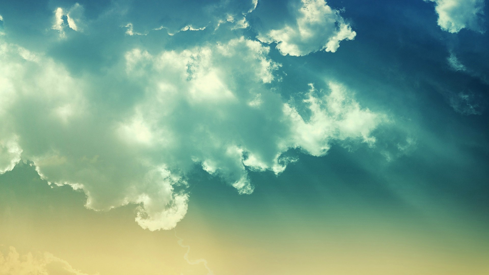 Sunlight filtering through clouds in the sky HD Wallpaper