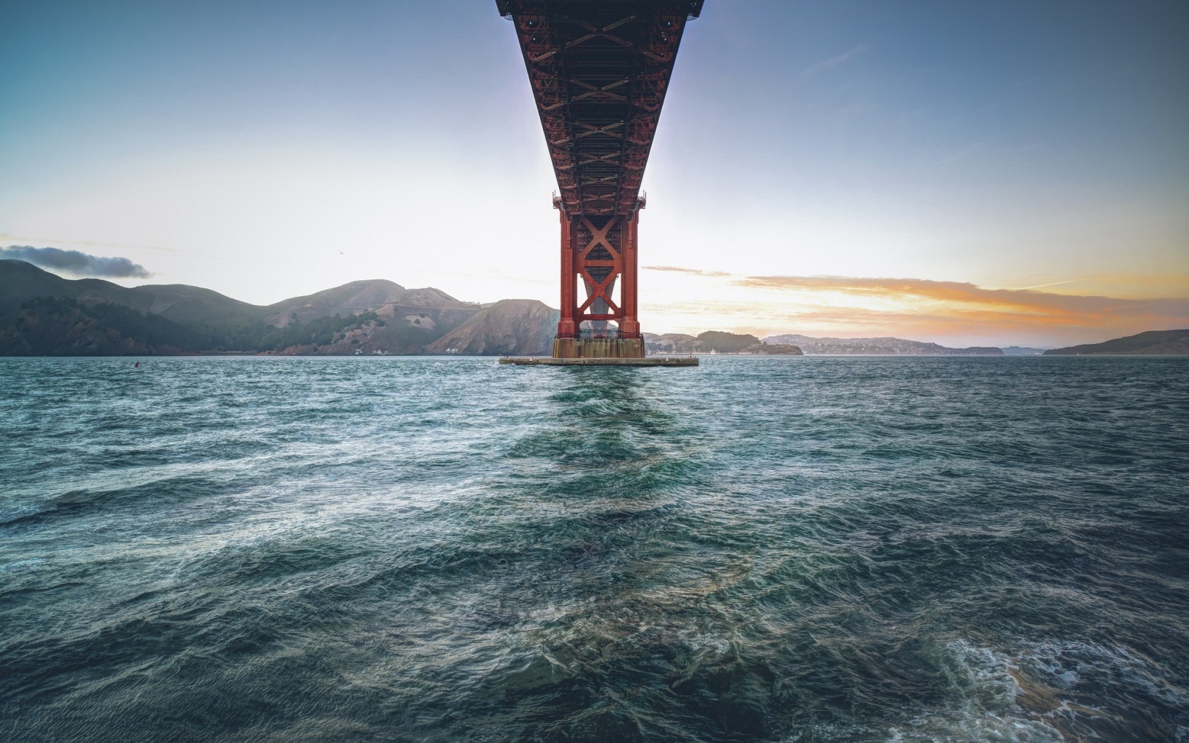 Golden Gate Bridge over the ocean at sunset HD Wallpaper