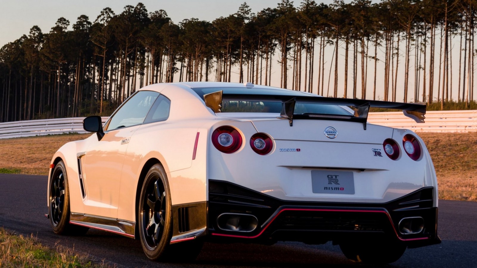 White Nissan GT-R Nismo on a Racetrack HD Wallpaper