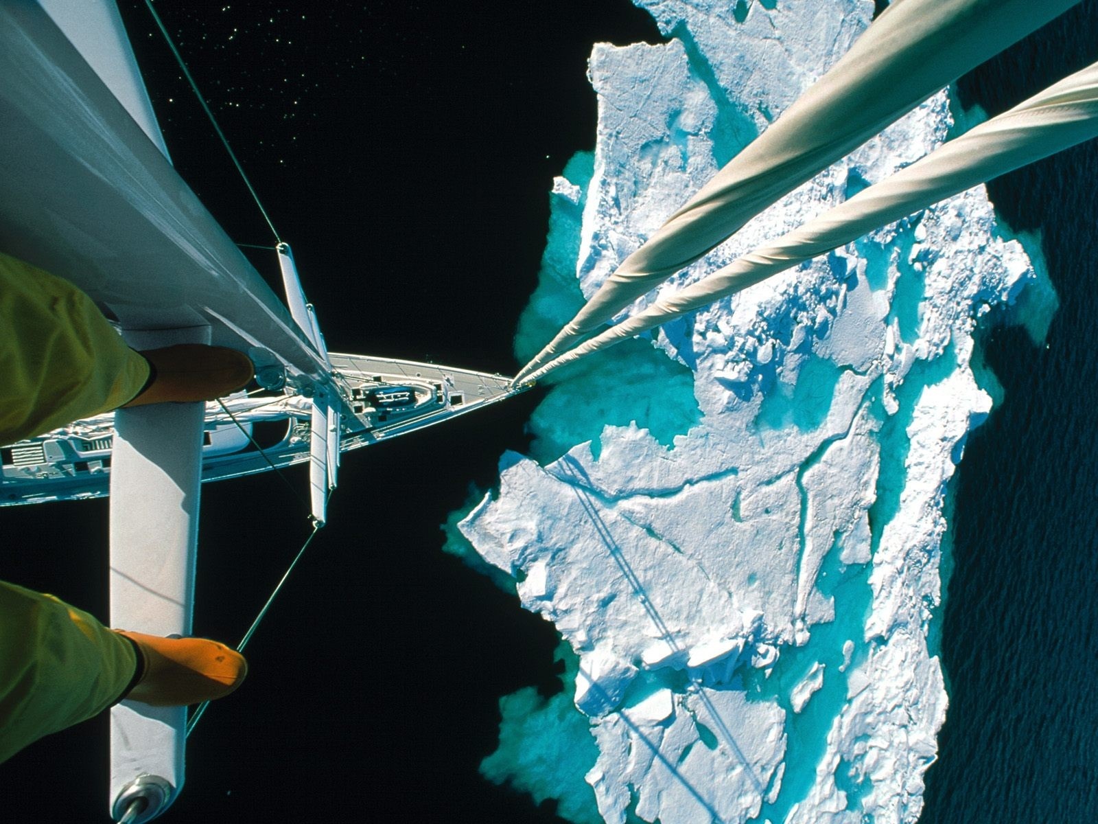 Sailing ship near icebergs from a bird's eye view HD Wallpaper